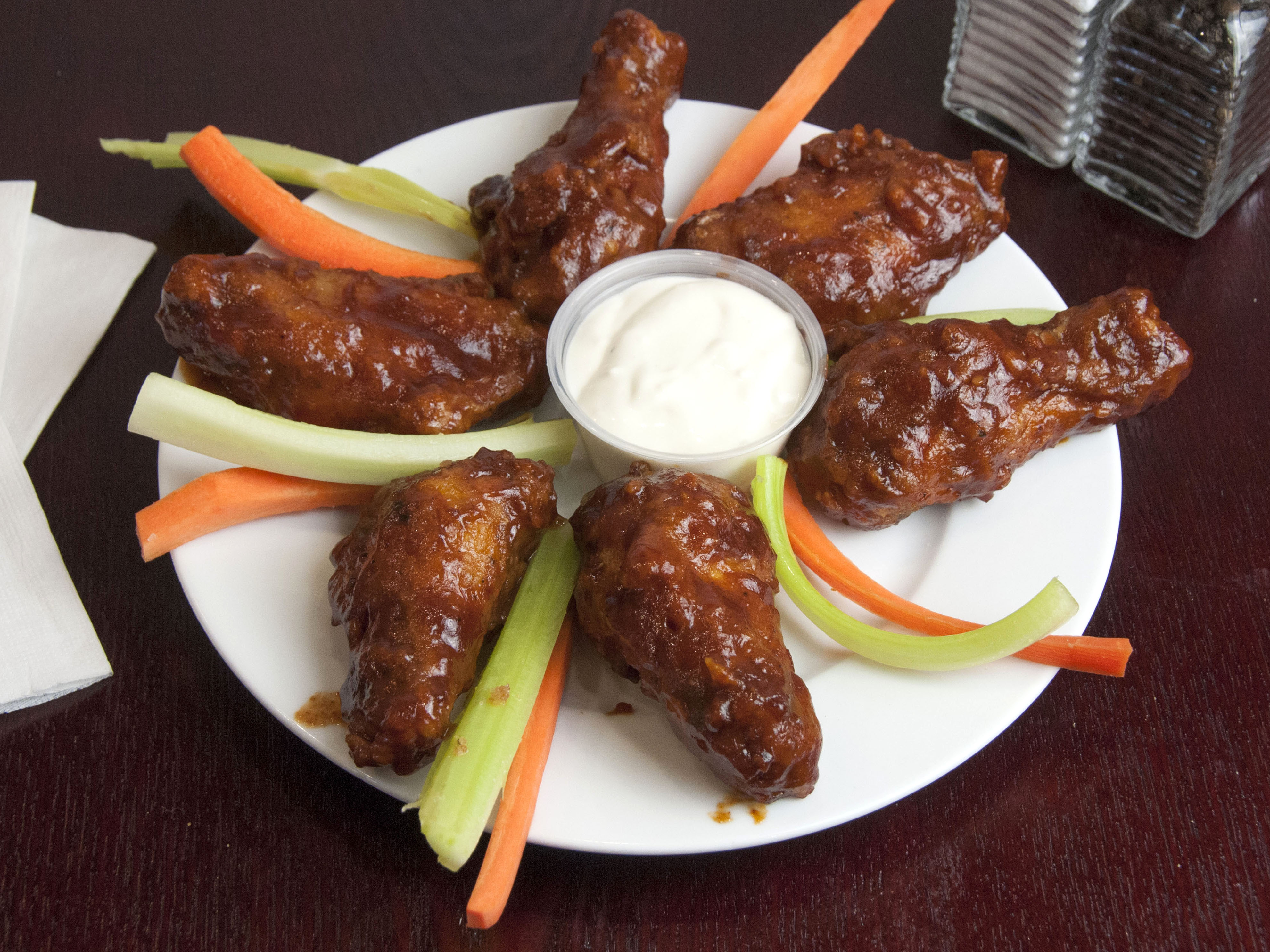 Order BBQ Wings food online from Pizza Stop store, New York on bringmethat.com