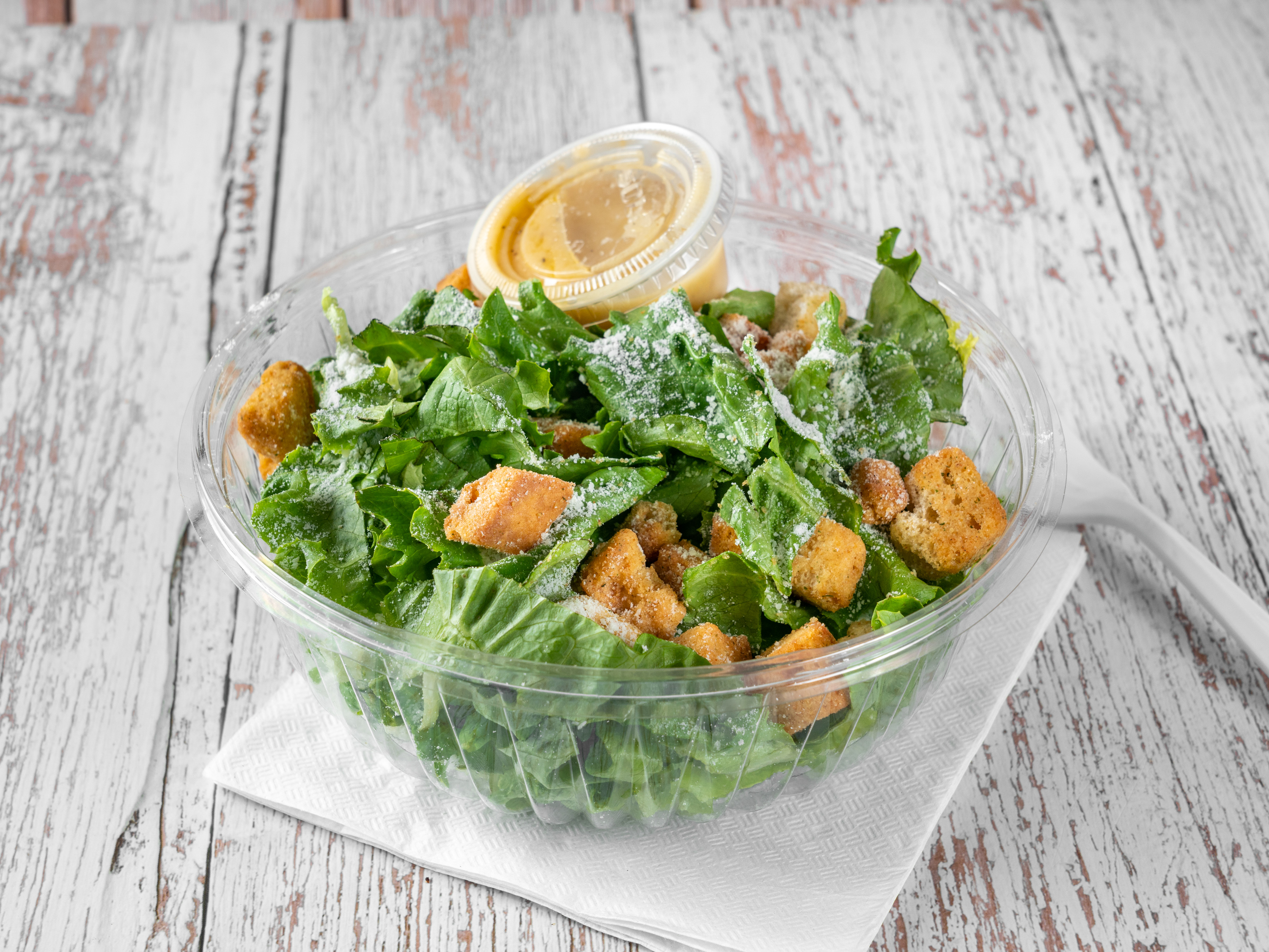 Order Caesar Salad food online from Hot Spot Deli store, Yonkers on bringmethat.com