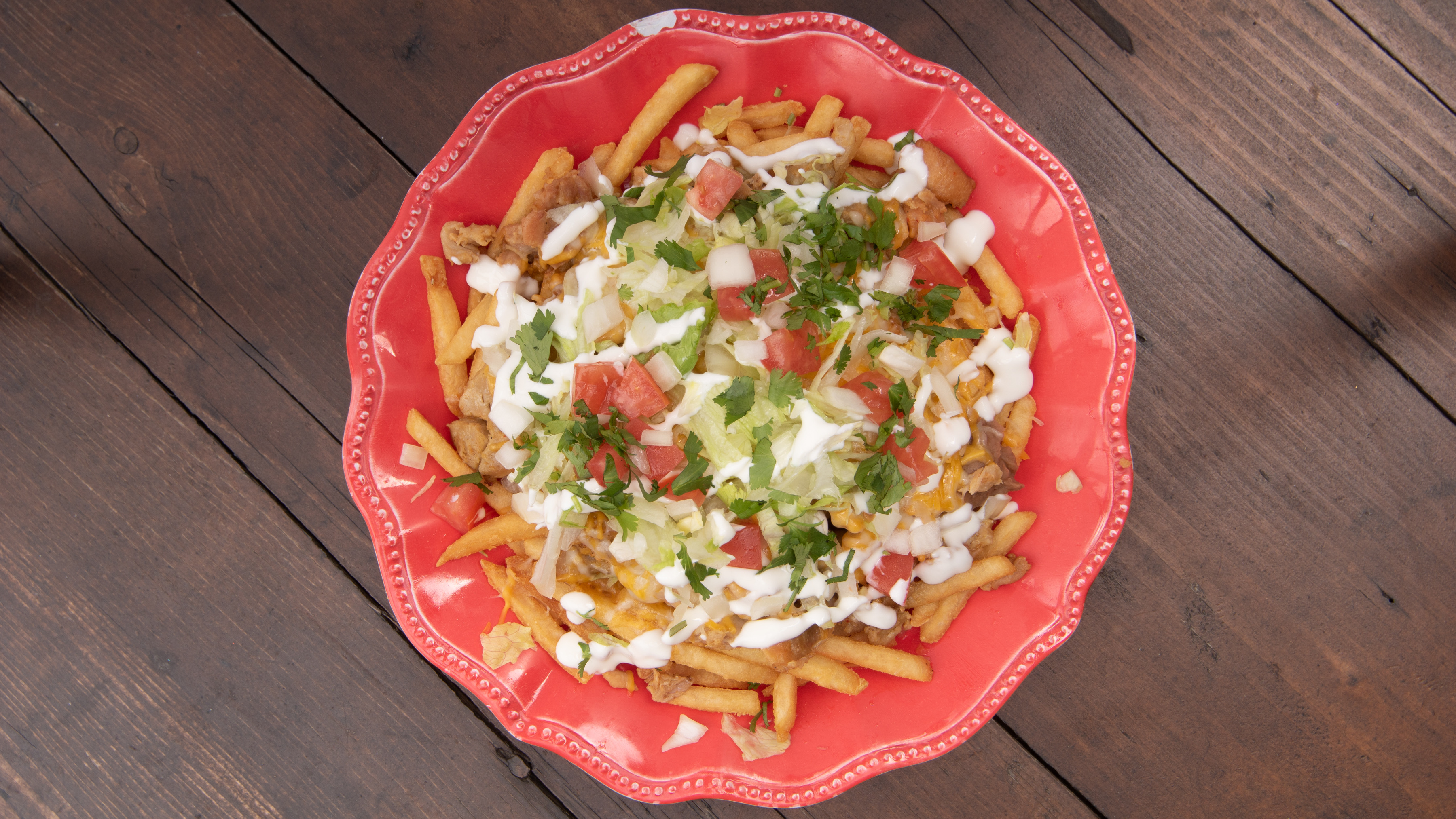 Order Asada Fries Plate food online from Cervantes Mexican Kitchen store, Anaheim on bringmethat.com