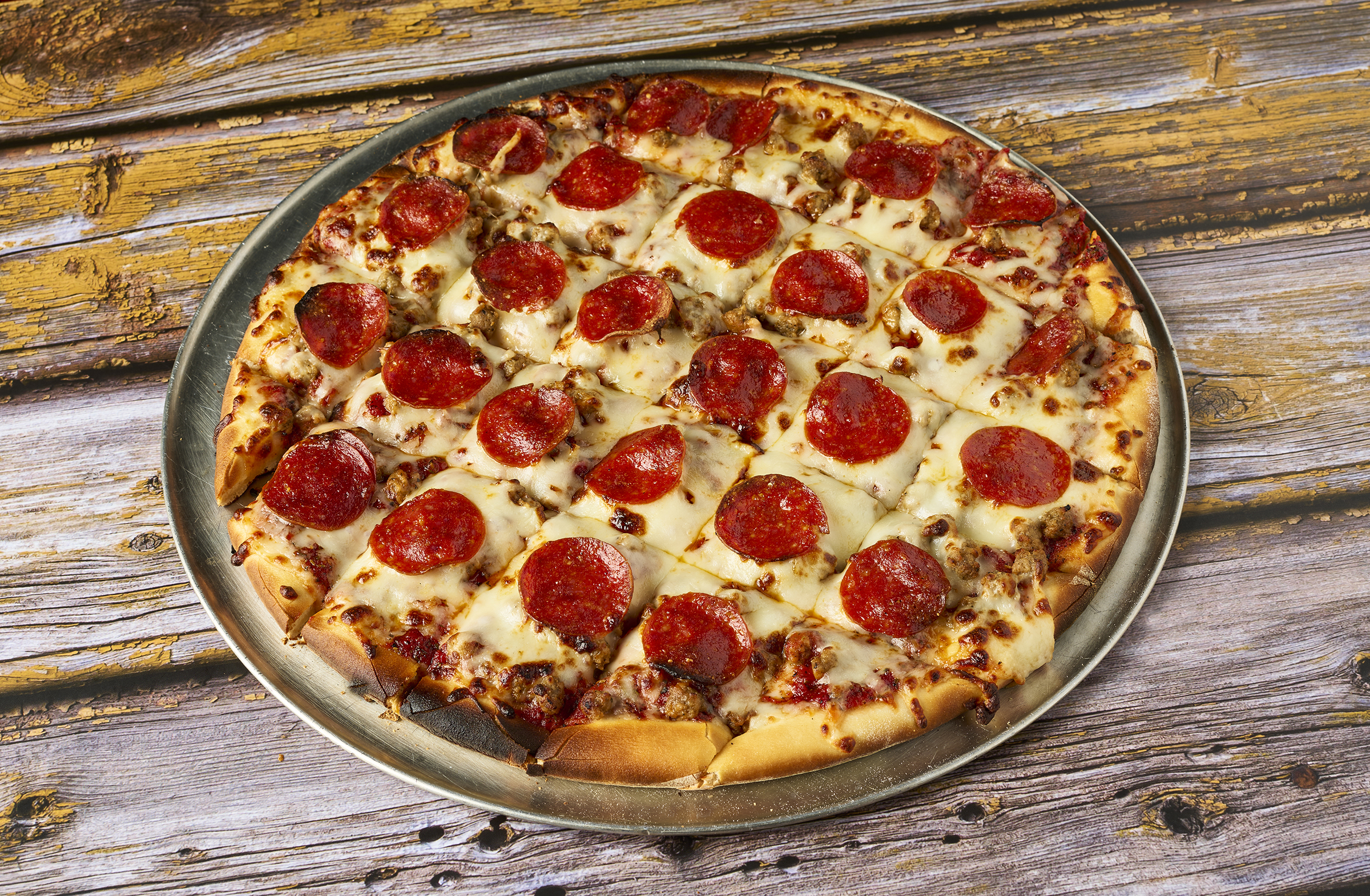 Order Pepperoni and Sausage Pizza food online from The Axe Bar store, Champaign on bringmethat.com