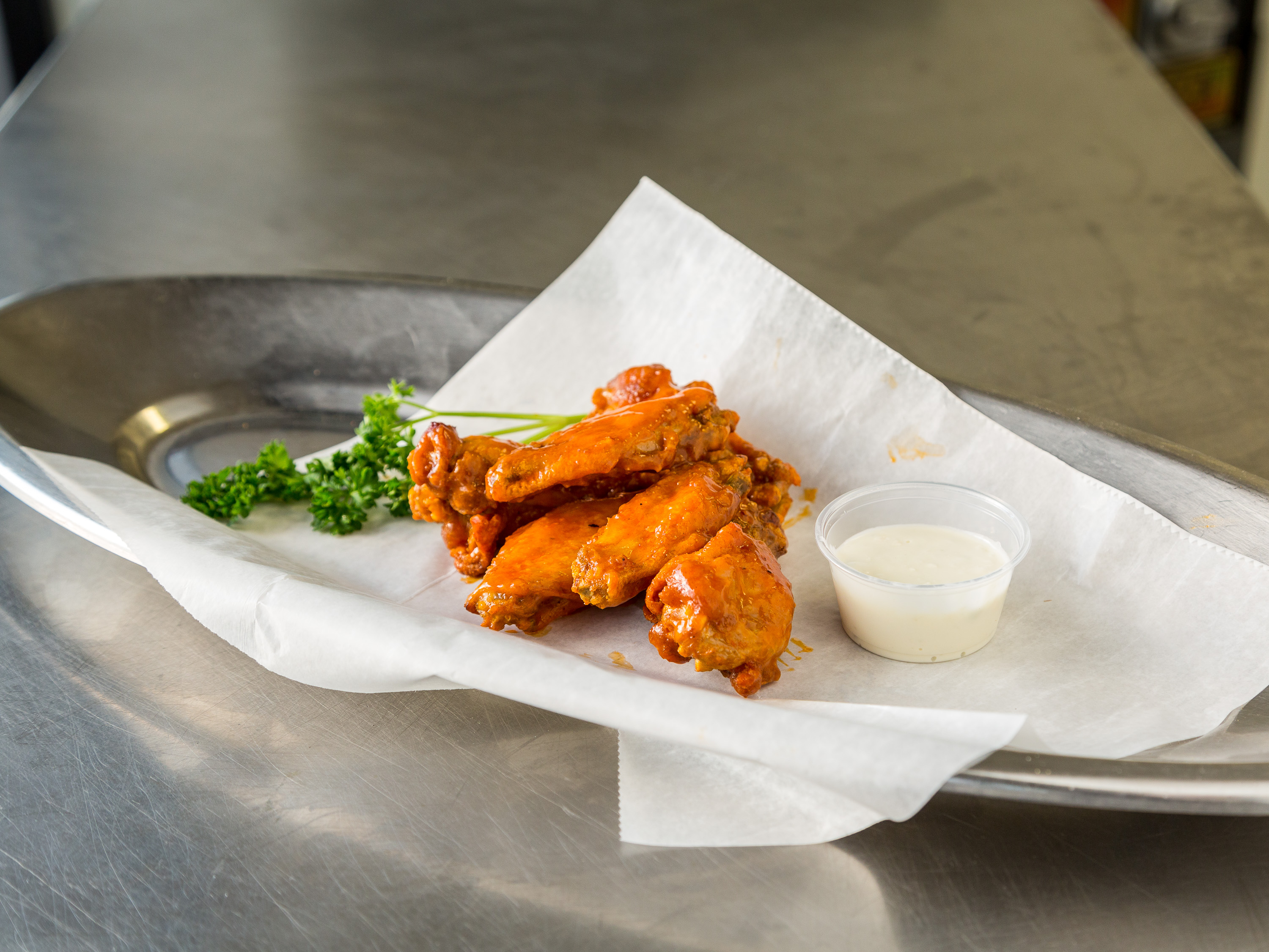 Order Wings food online from Revolution Pizza store, Willowick on bringmethat.com