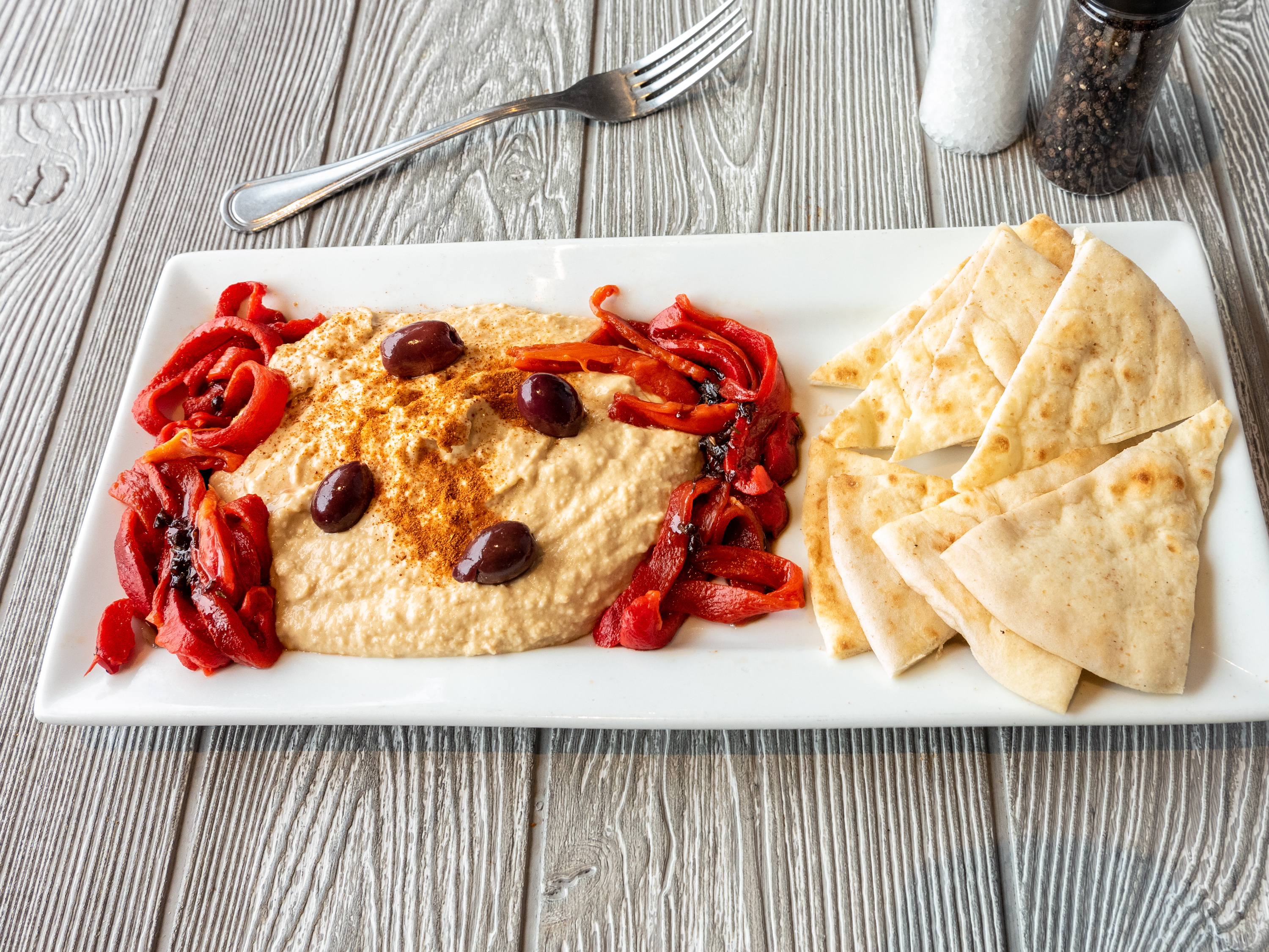 Order Hummus and Roasted Red Peppers food online from Bonu Cafe Express store, Exton on bringmethat.com