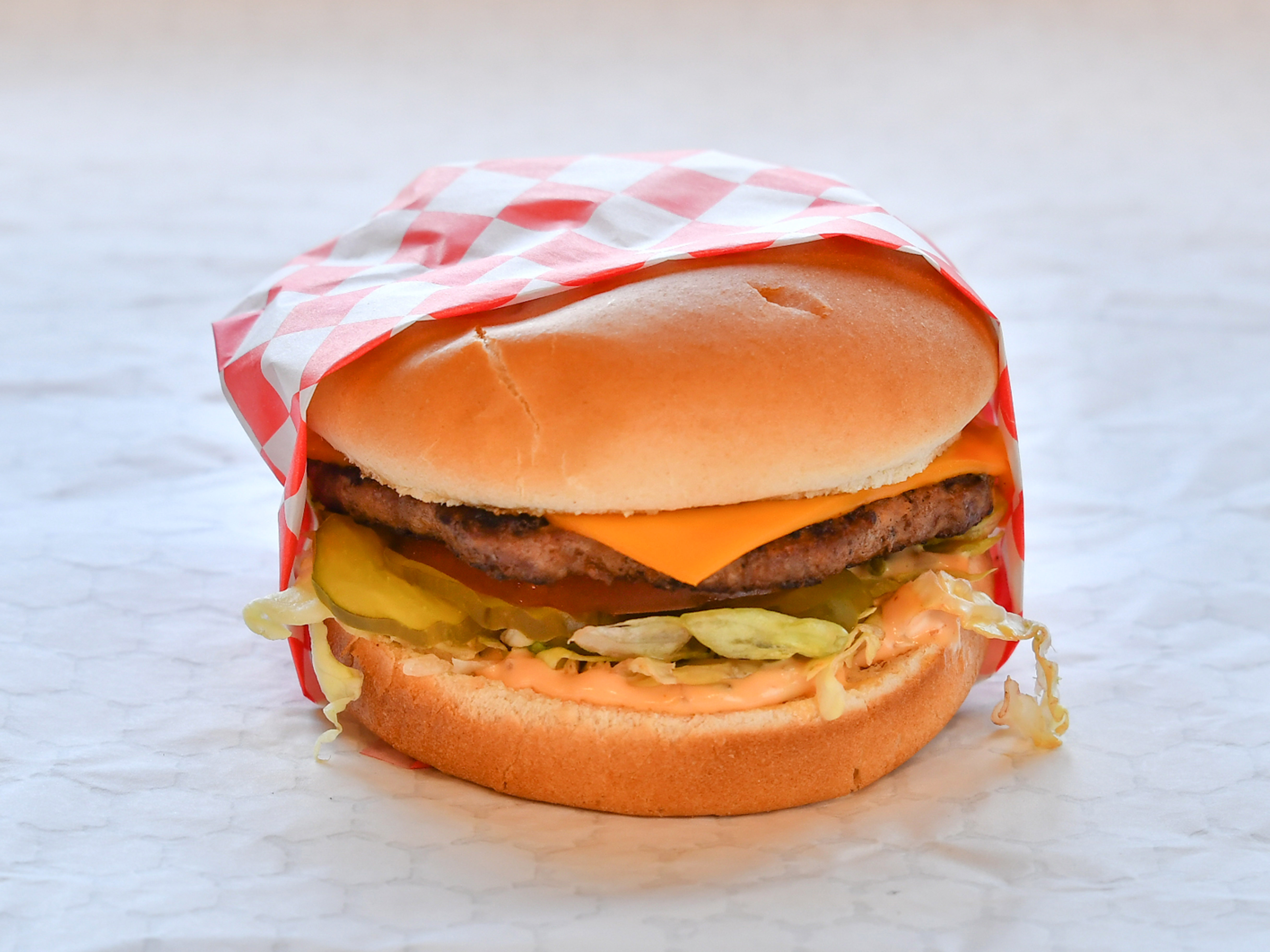 Order Cheeseburger food online from Wheeler Handout store, Nampa on bringmethat.com