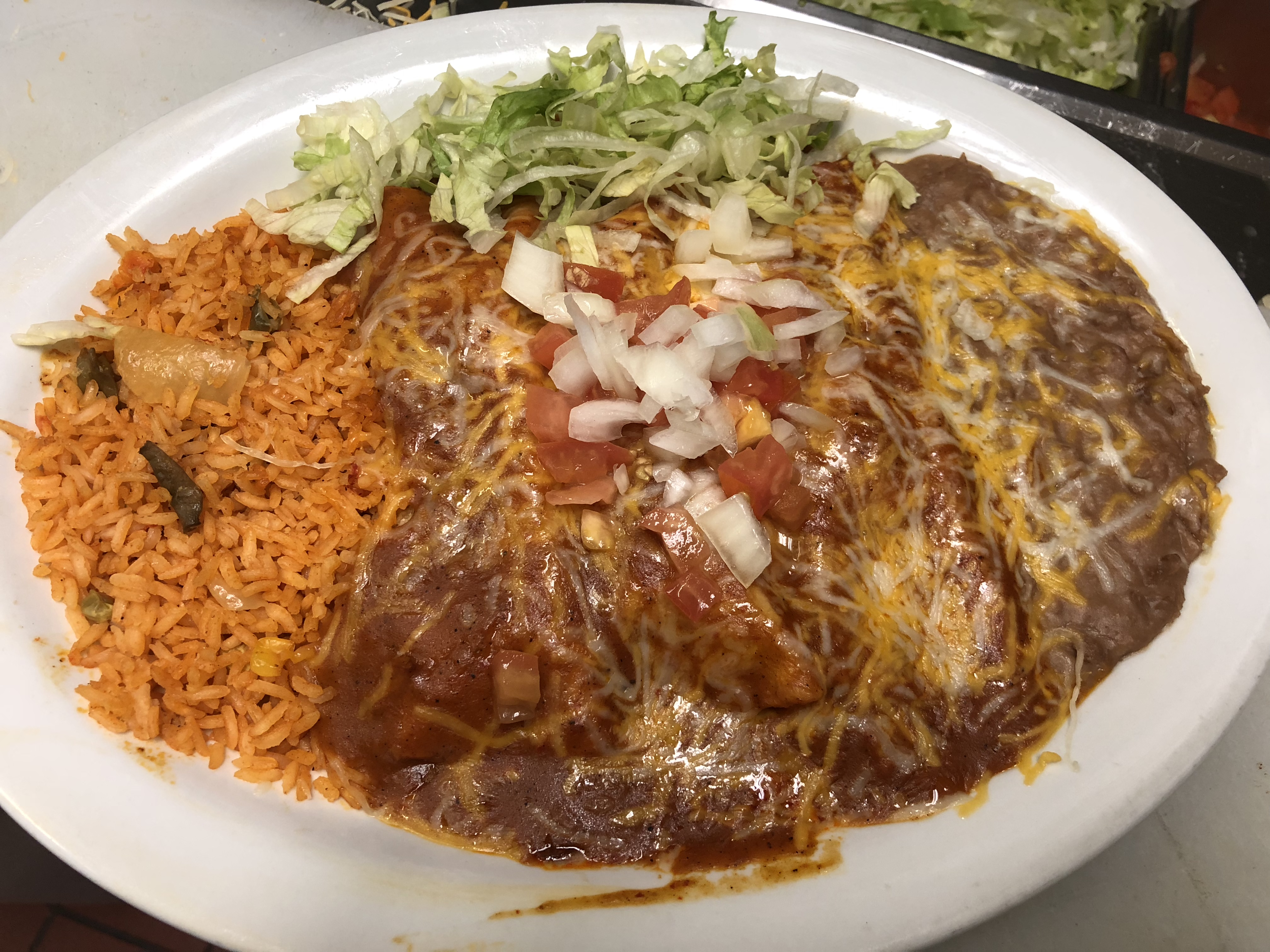 Order 31. Cheese Enchilada Plate food online from Los Alcatraces Mexican Restaurant store, Aurora on bringmethat.com