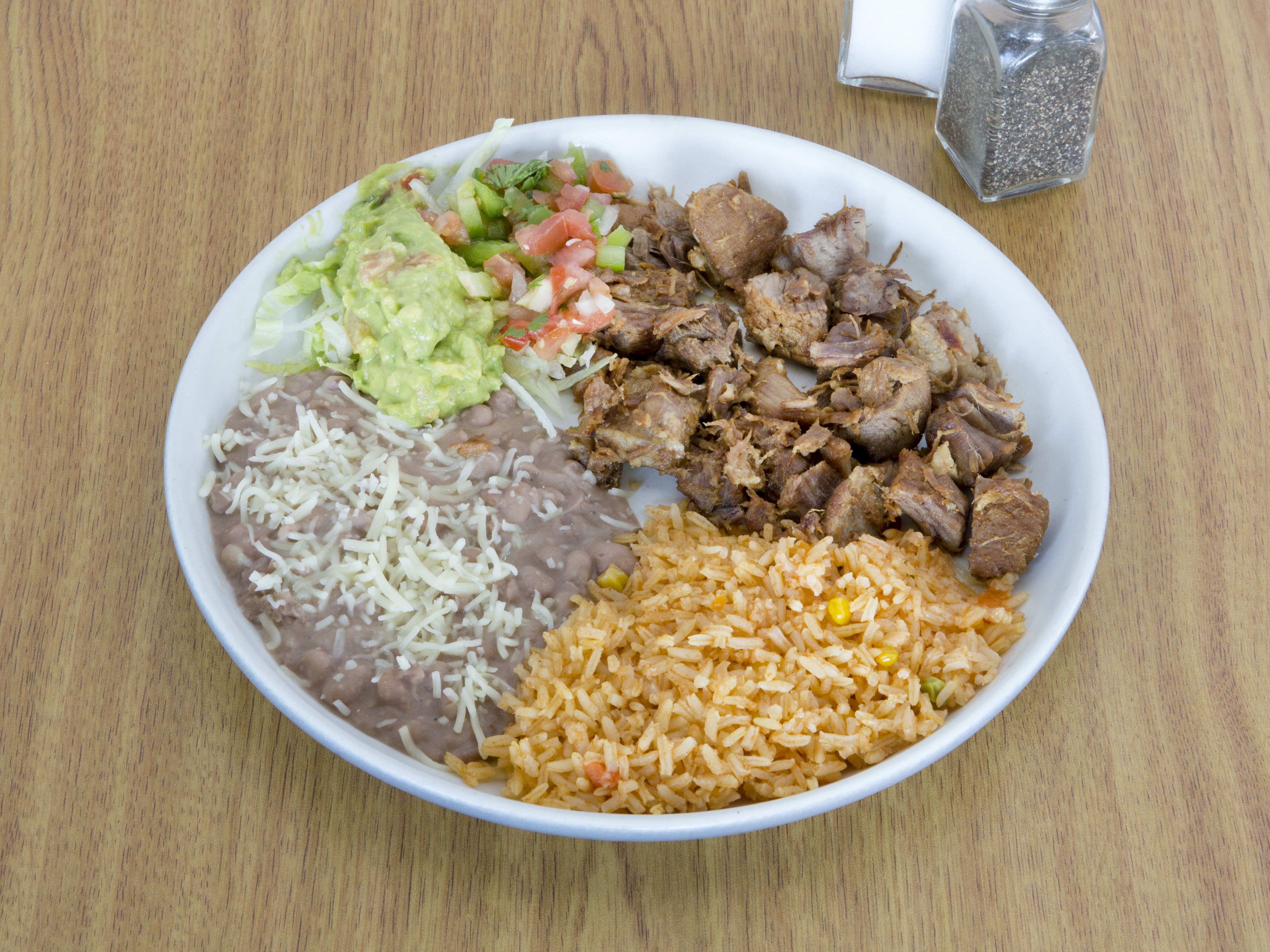 Order Carnitas Plate food online from Ana Kitchen store, Glendale on bringmethat.com