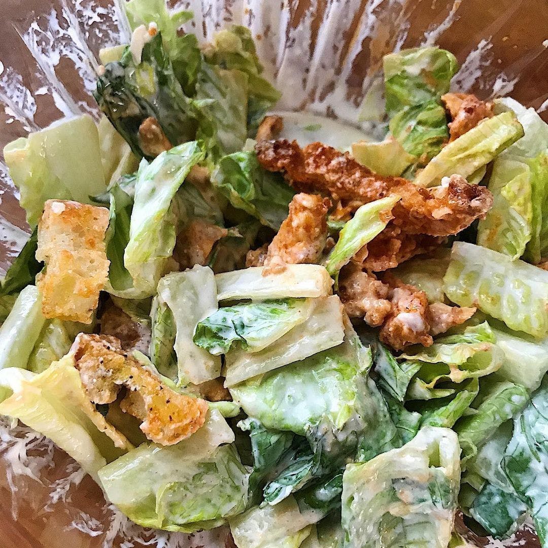 Order Buffalo Chicken Caesar Salad - Small food online from Francesca Pizza & Pasta store, Elmwood Park on bringmethat.com