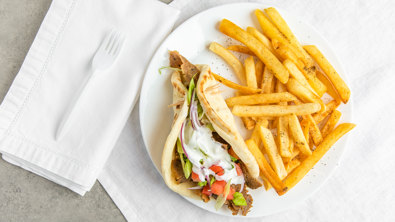Order 1. Gyro Sandwich with Fries Combo food online from Greek In The Box store, Springfield on bringmethat.com