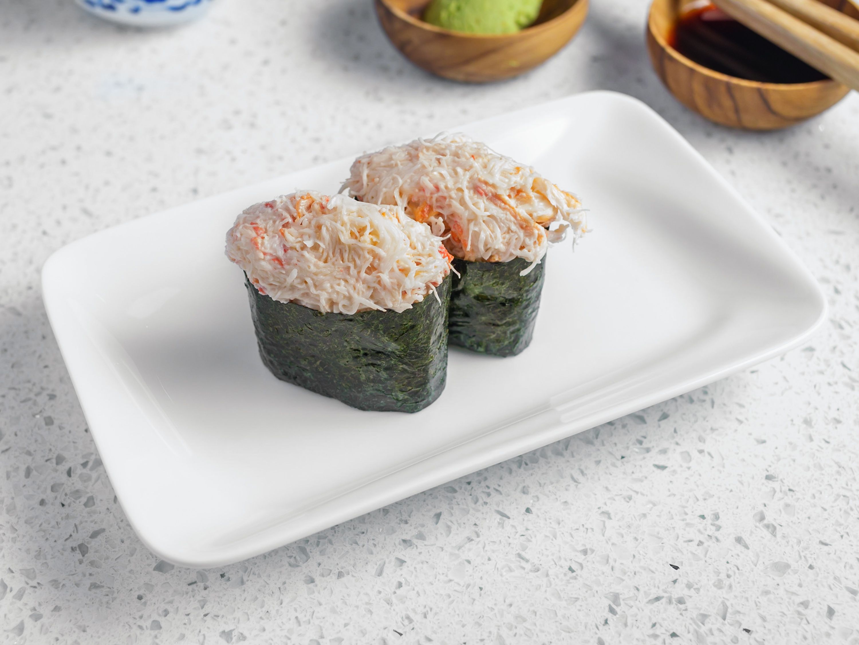 Order Kani Nigiri food online from Wasabi Bistro store, San Francisco on bringmethat.com