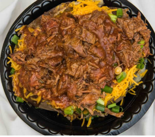 Order Baked Potato w/ trimmings and Meat food online from Central Texas Style BBQ store, Pearland on bringmethat.com