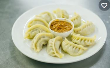 Order 10 Piece Vegetable Momo food online from Royal Kitchen store, Cockeysville on bringmethat.com