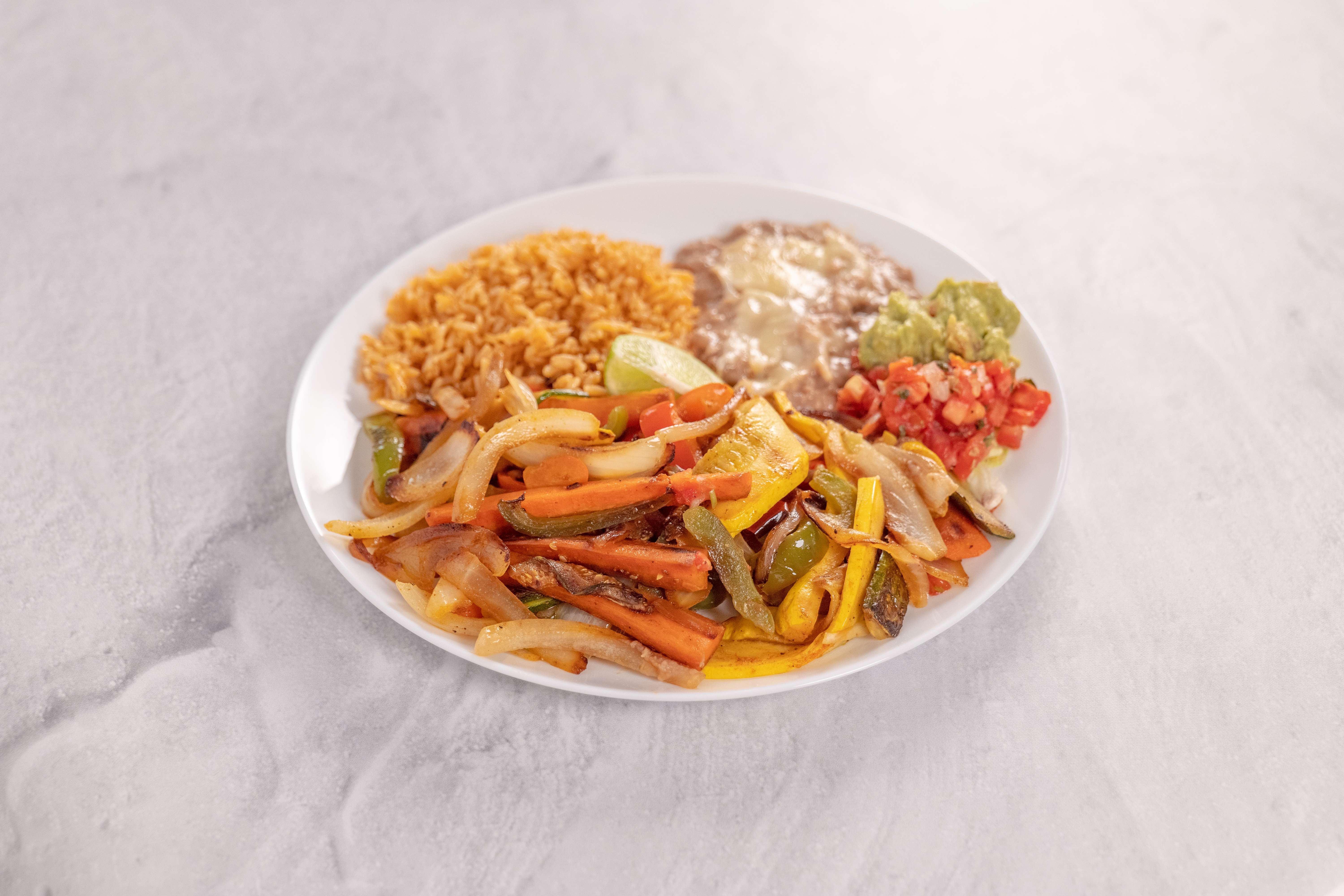 Order Veggie Fajitas food online from El Mariachi Mexican Grill & Sports Cantina store, Encino on bringmethat.com