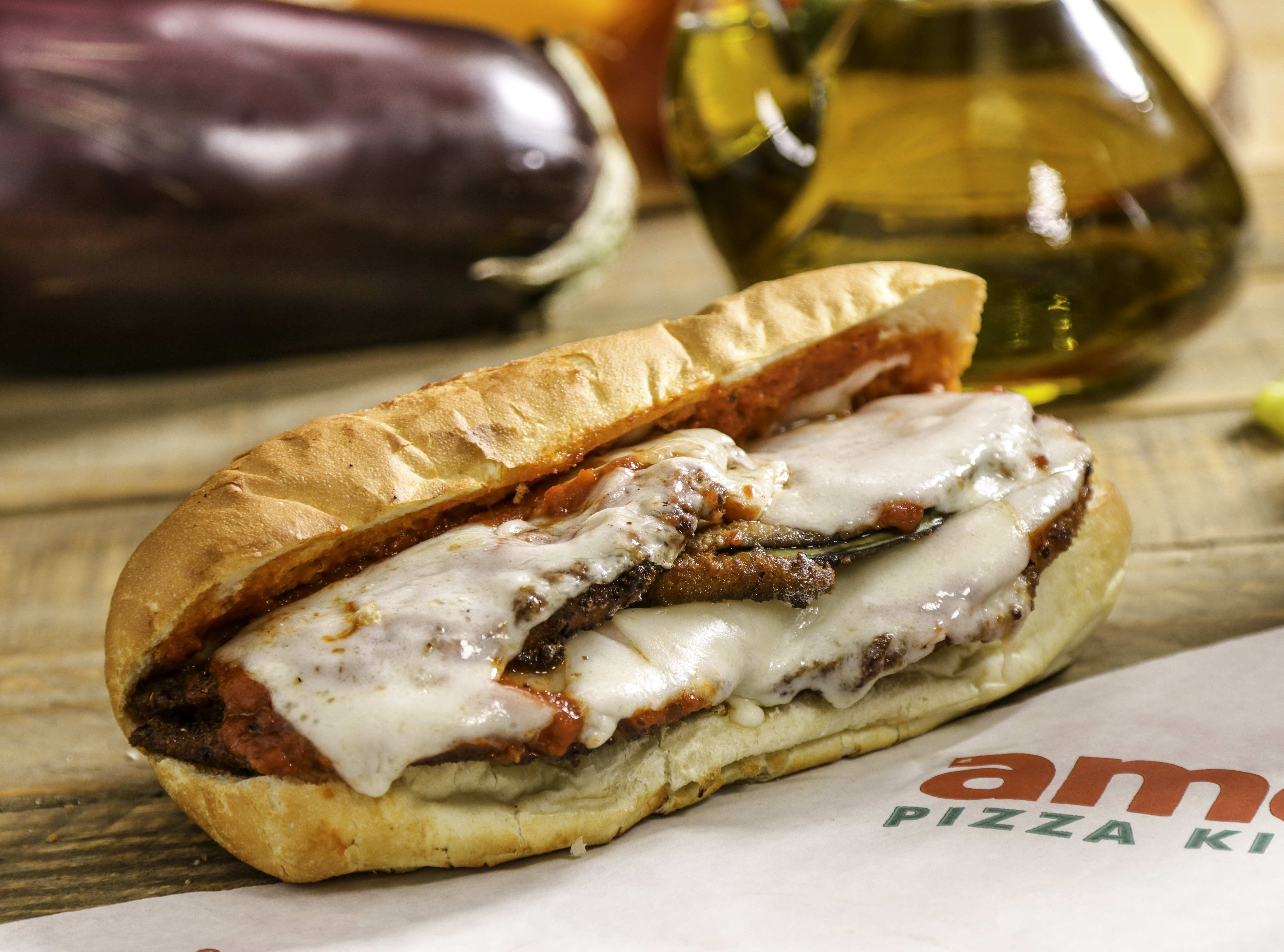 Order 13. Eggplant Parmigiana Sandwich Lunch food online from Ameci Pizza & Pasta store, Lake Forest on bringmethat.com
