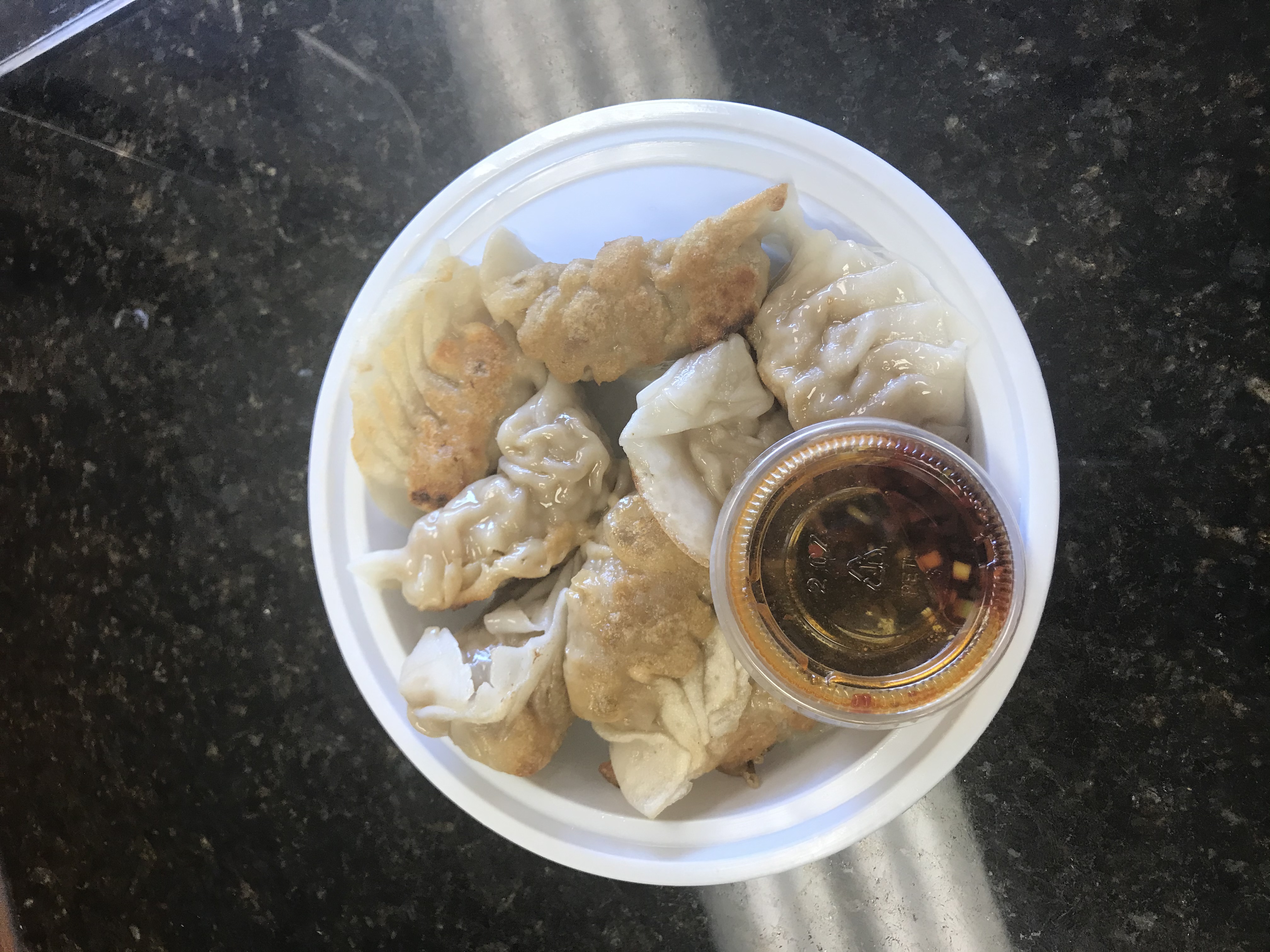 Order 8 Piece Fried Dumplings 锅贴 food online from China Star store, Blue Bell on bringmethat.com