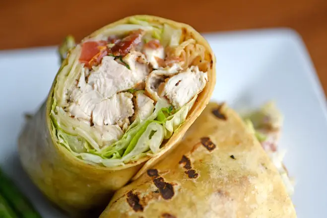 Order Grilled Chicken Ceasar Wrap food online from Grindstone Tap House store, Berea on bringmethat.com