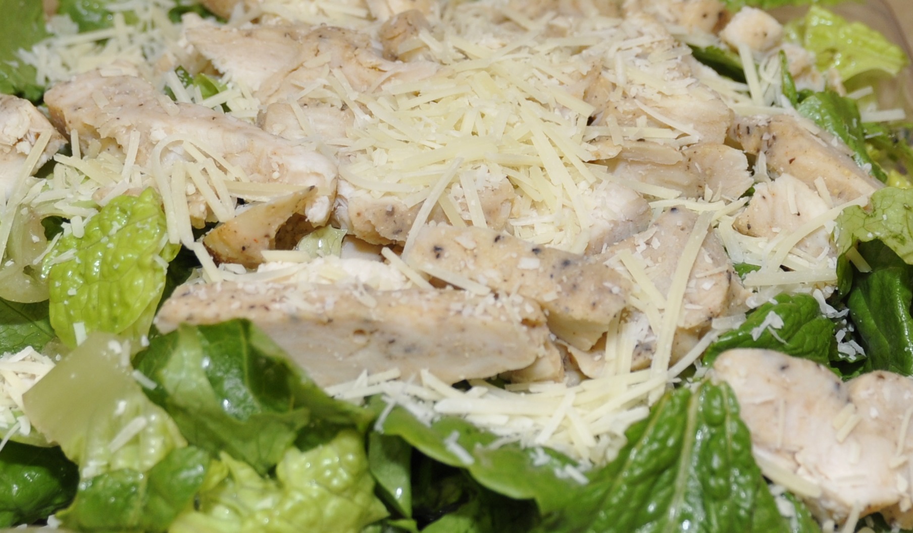 Order Chicken Caesar Salad food online from Mega Pizza store, Raleigh on bringmethat.com