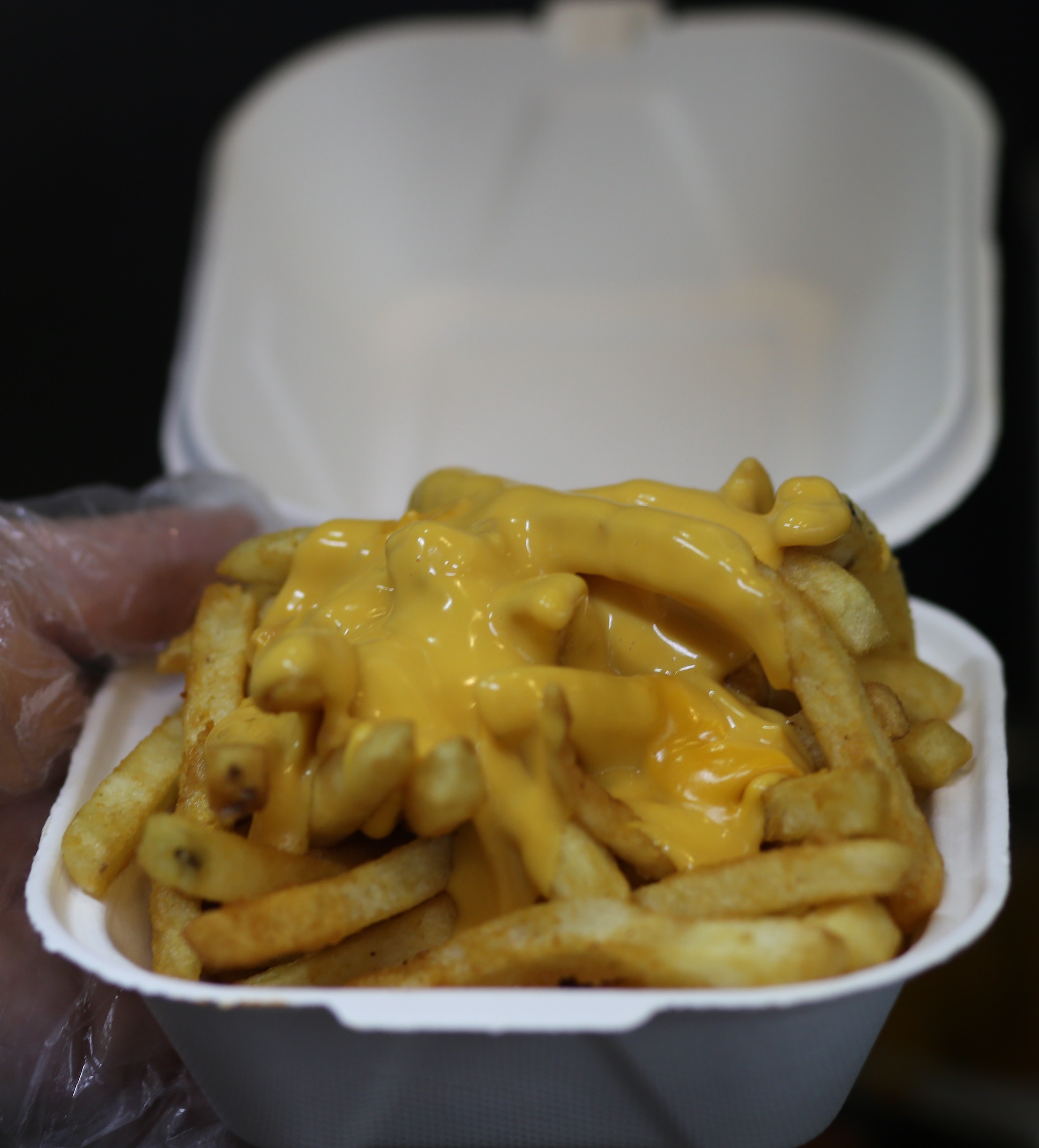 Order Cheese Fries food online from The Burger Joint store, New York on bringmethat.com
