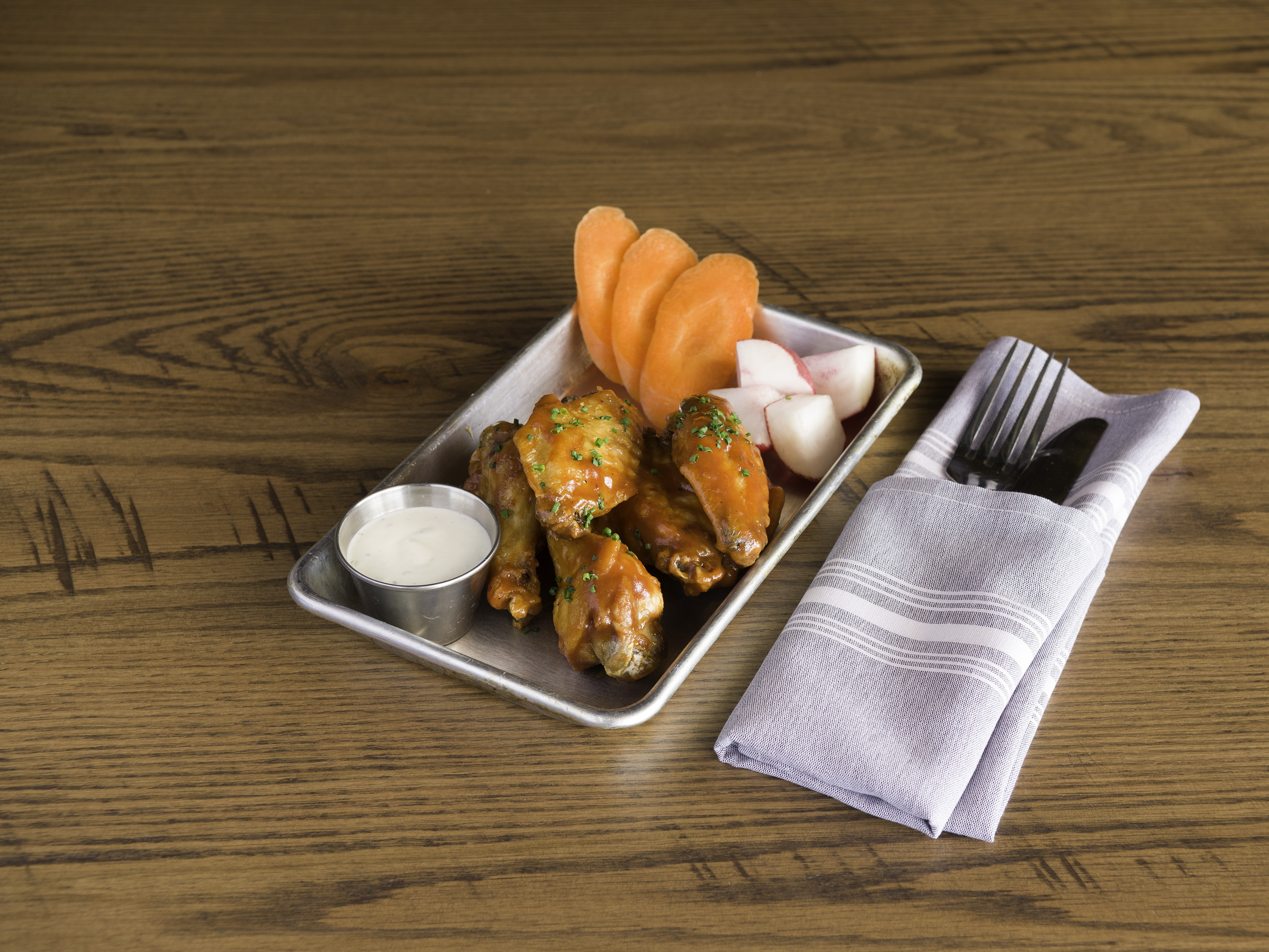 Order Wings Confit food online from Copper & Logs store, Gilbert on bringmethat.com