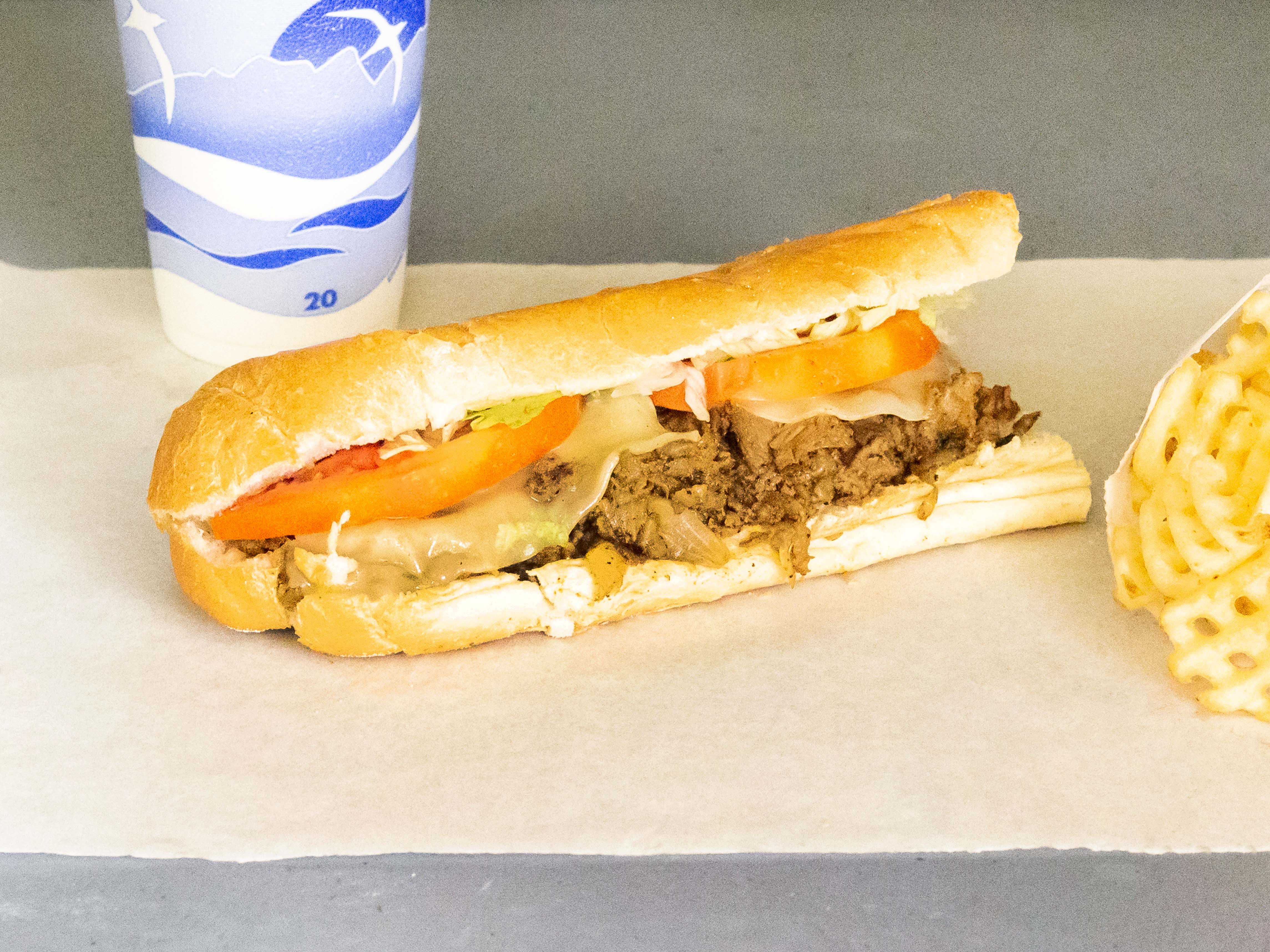Order 12” Philly Steak and Cheese Sub food online from Manhattan Pizza & Subs store, Greensboro on bringmethat.com