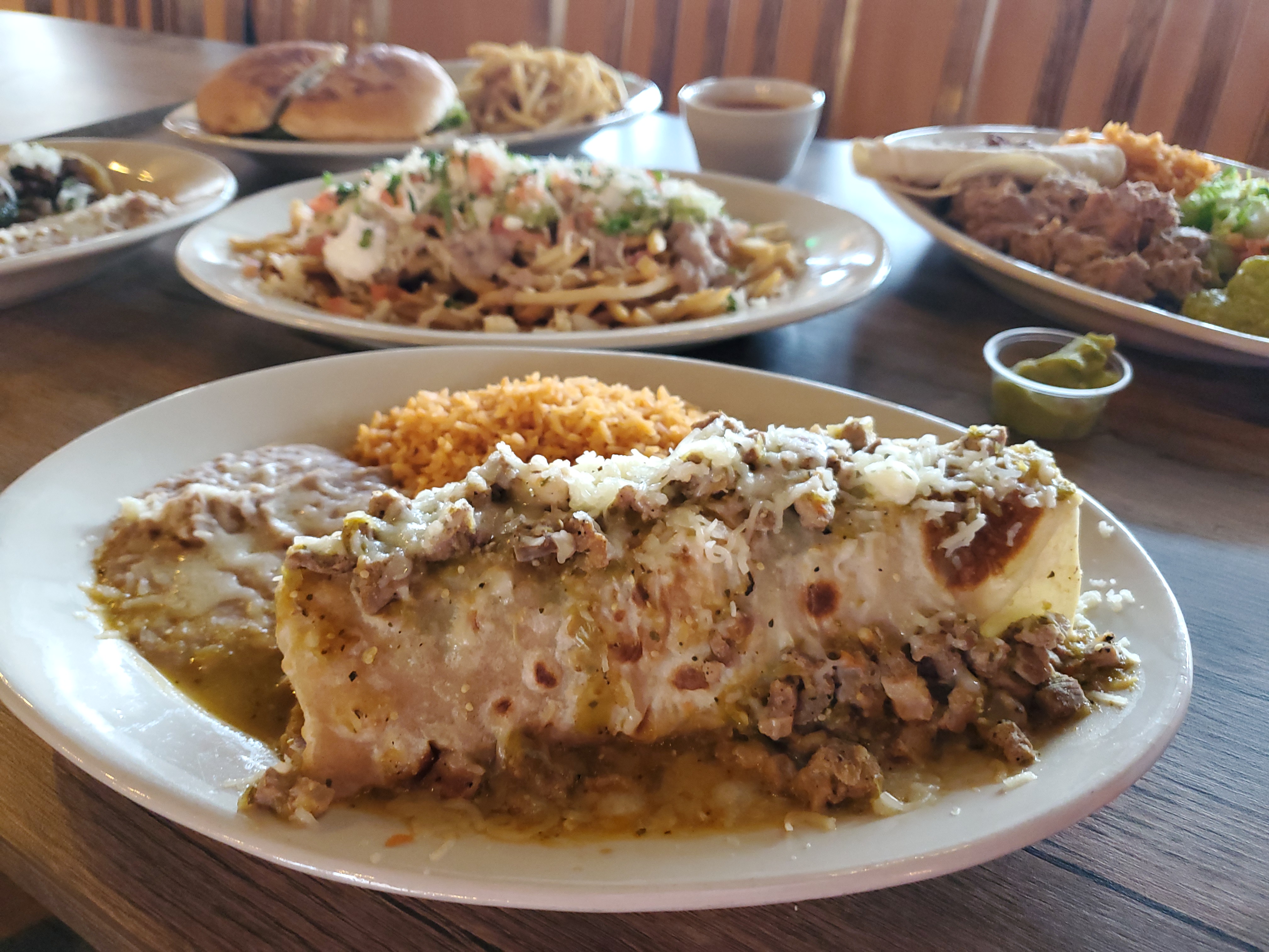 Order 7. Pork Chile Verde Smothered Burrito Plate Combo food online from Mi Corazon Mexican Restaurant store, Spanish Fork on bringmethat.com