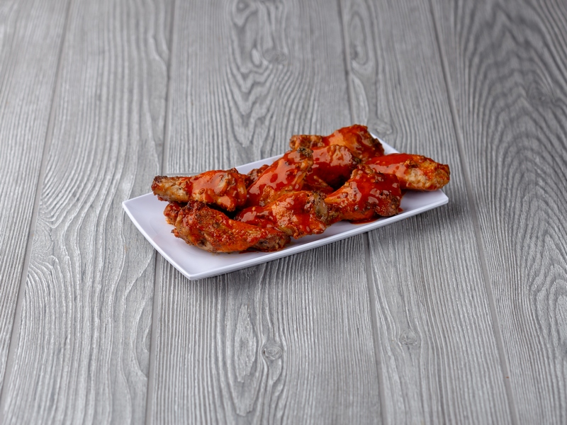 Order Buffalo Wings food online from Deno's Pizza store, Long Beach on bringmethat.com