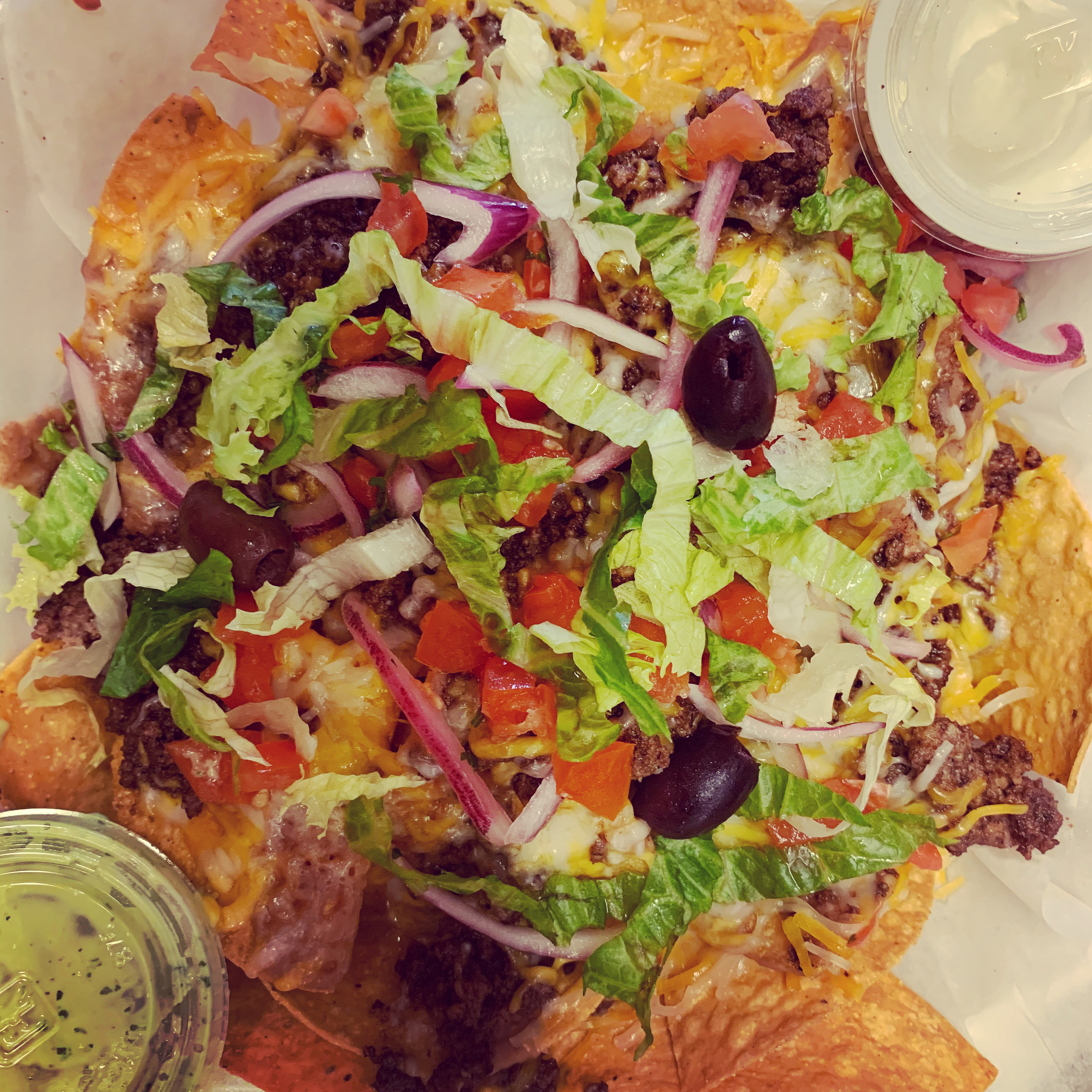 Order Nachos Deluxe food online from The Roasting Oven store, Fort Mill on bringmethat.com