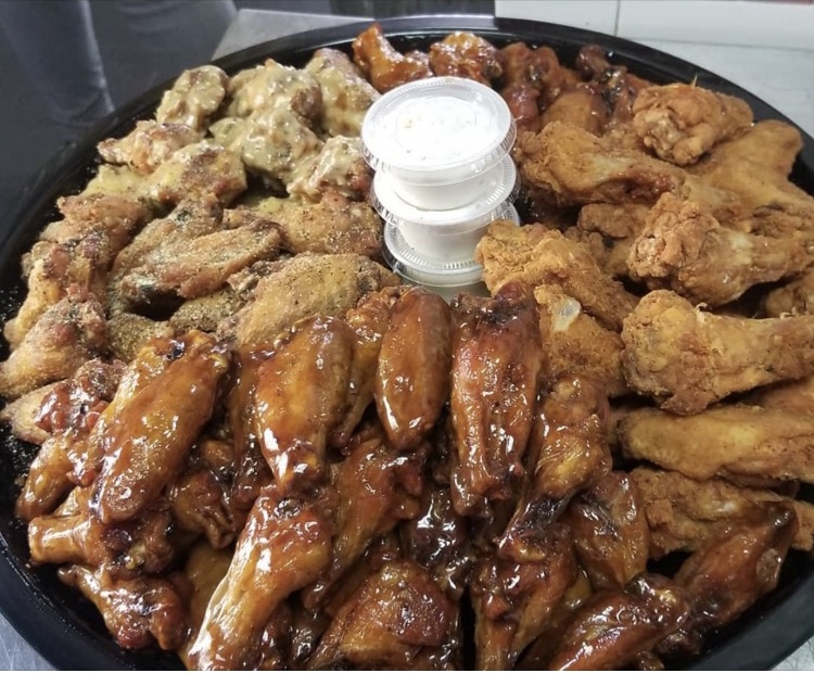 Order 50 Wings food online from Flava Wingz Spot store, Irvington on bringmethat.com