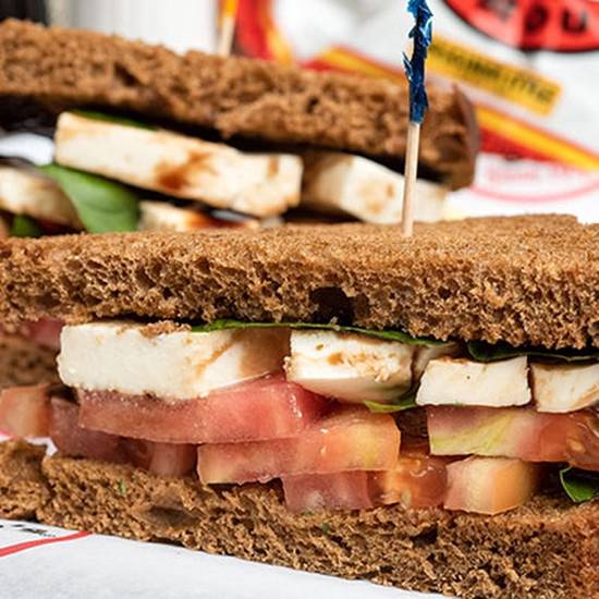 Order *Caprese Sandwich food online from Groucho's Deli store, Rock Hill on bringmethat.com