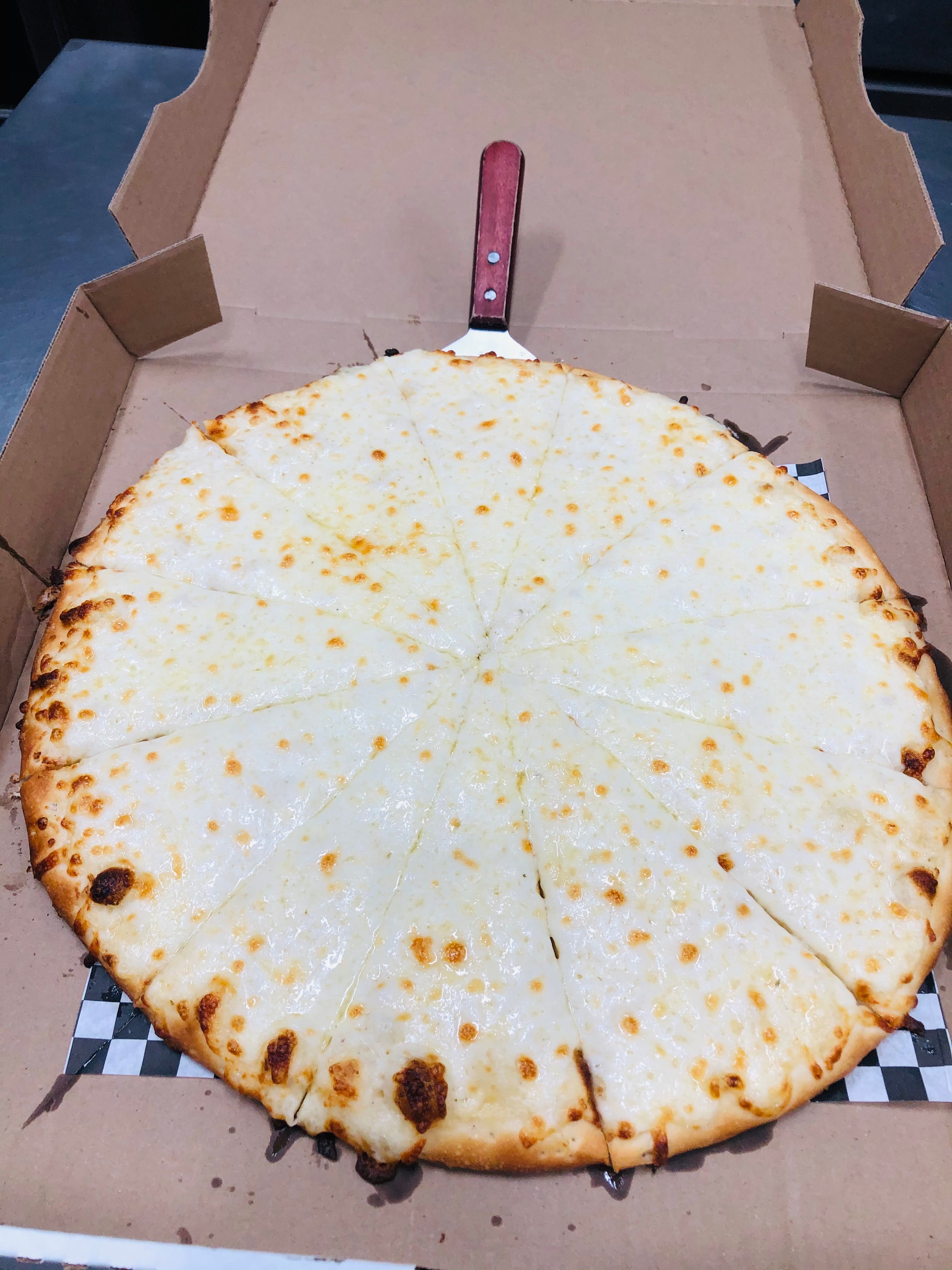 Order White Alfredo Pizza - Regular 14" (8 Slices) food online from Oros Pizza & Bakery store, Van Nuys on bringmethat.com