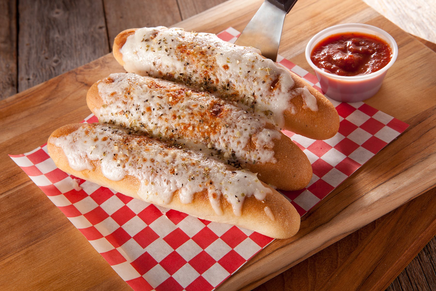Order Cheesy Bread Sticks - Appetizer food online from Crooked Crust-Farmers Branch store, Farmers Branch on bringmethat.com
