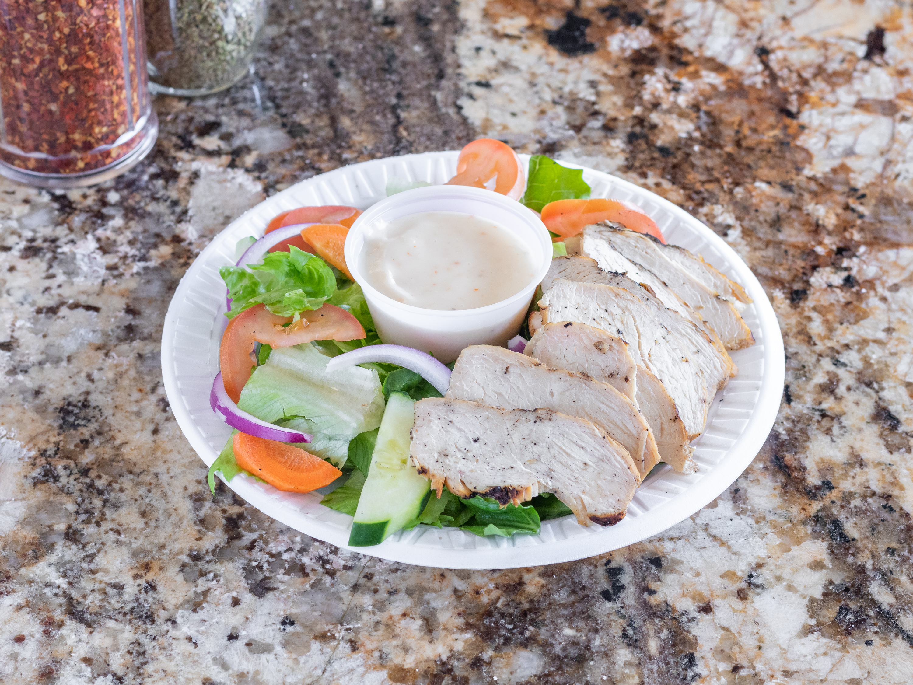 Order Grilled Chicken Caesar Salad food online from Primo Brick Oven Pizza store, Norristown on bringmethat.com