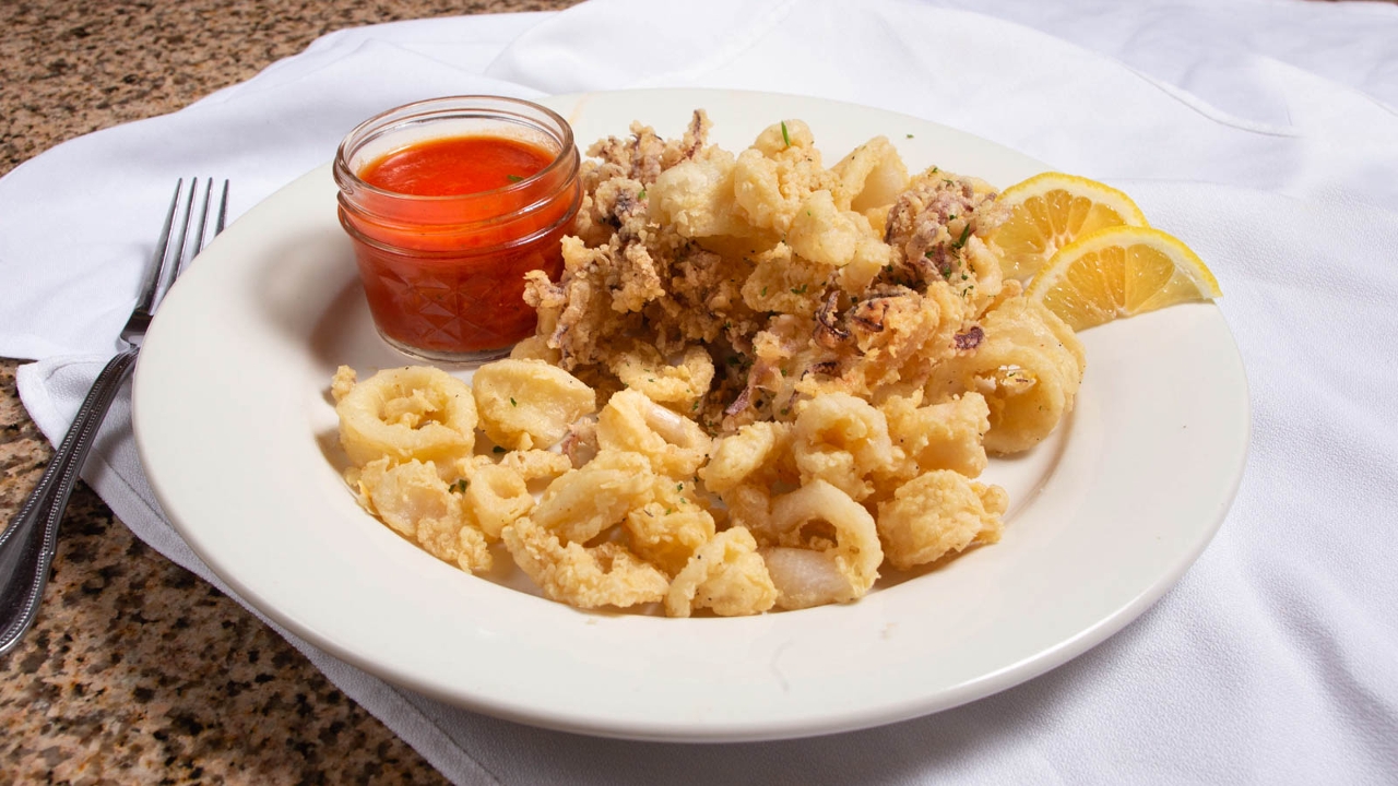 Order Calamari food online from Sliceworks store, Denver on bringmethat.com