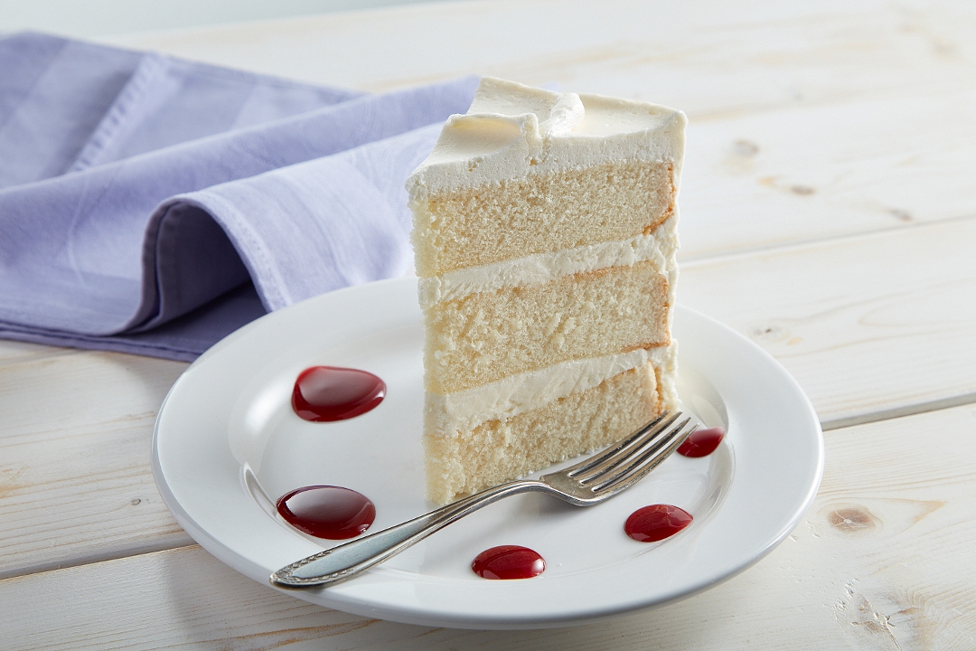 Order French Vanilla Cake, slice food online from Dessert Gallery Bakery & Cafe store, Houston on bringmethat.com