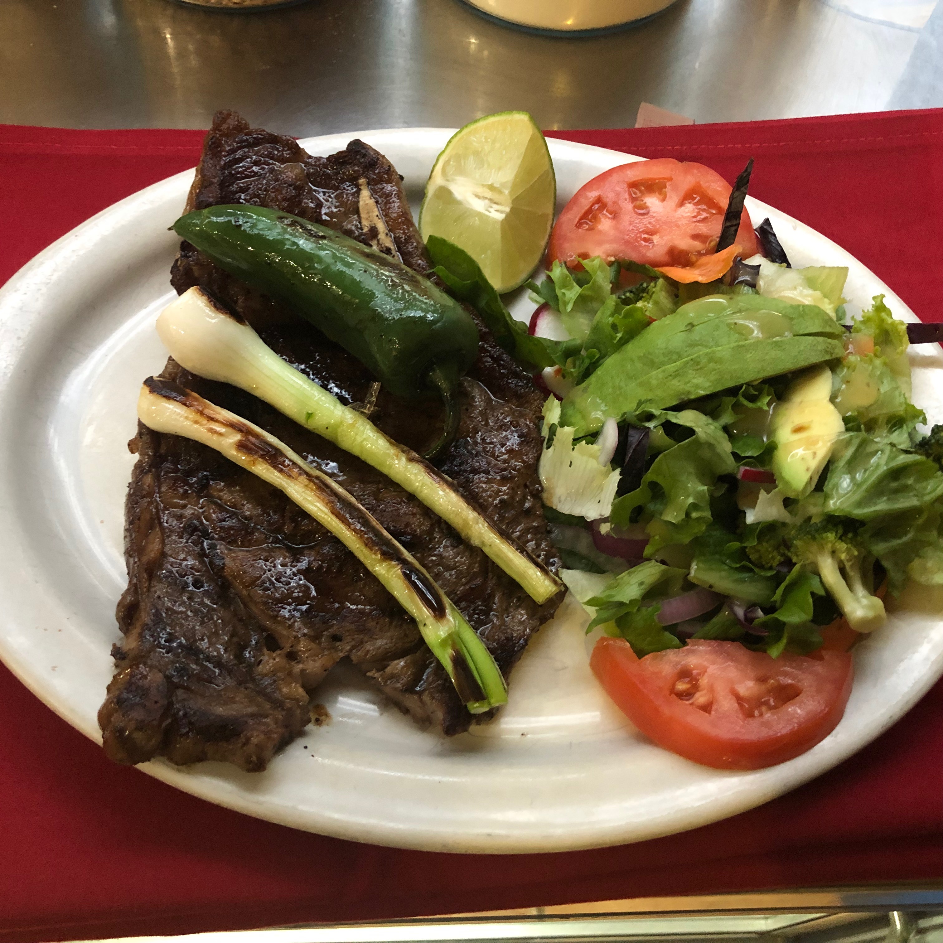 Order Carne Asada Platillo with house salad food online from Puebla Seafood store, Jackson Heights on bringmethat.com