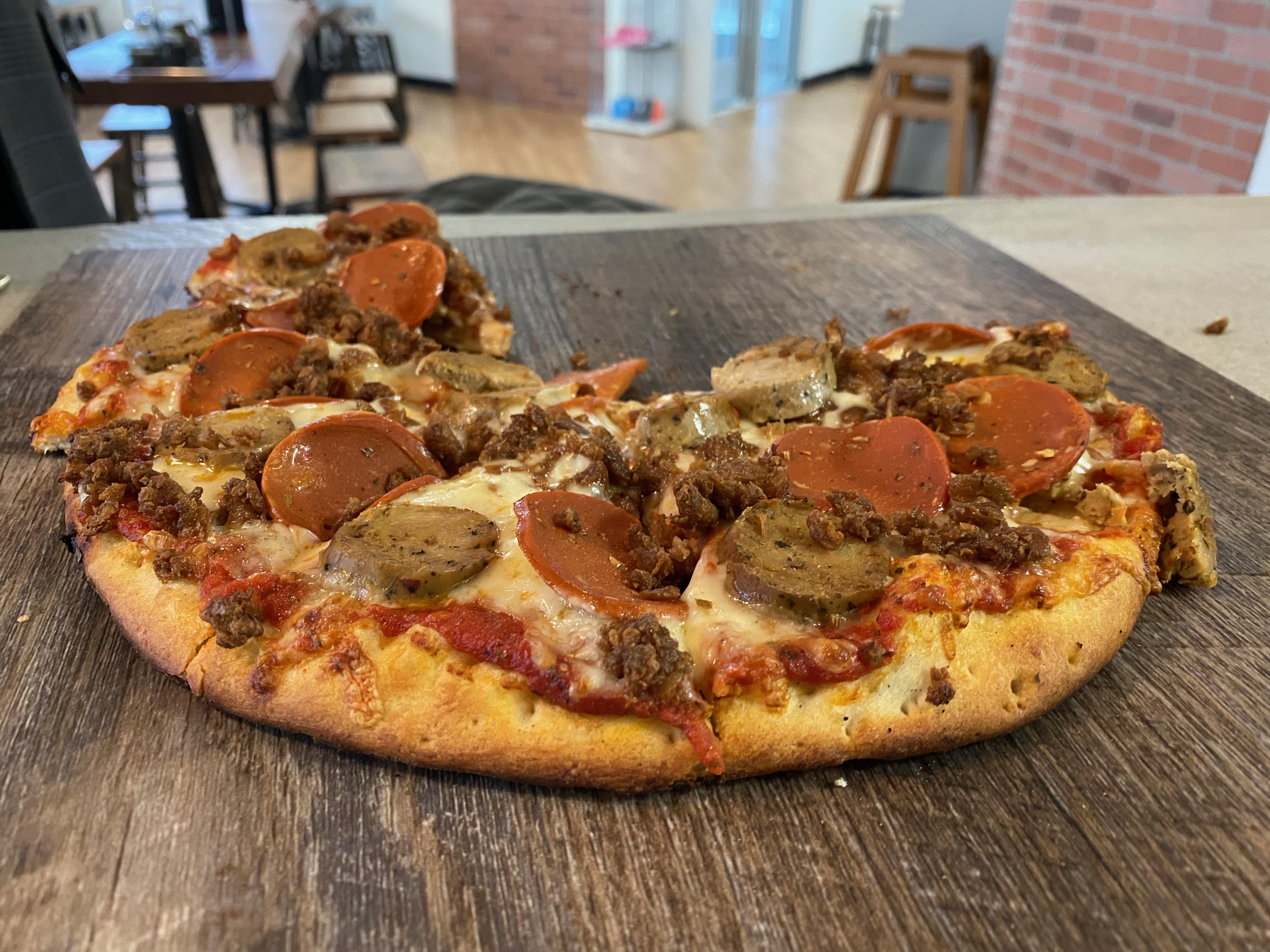 Order The "Meat" Lovers Pizza food online from Midtown Pizza store, Dallas on bringmethat.com