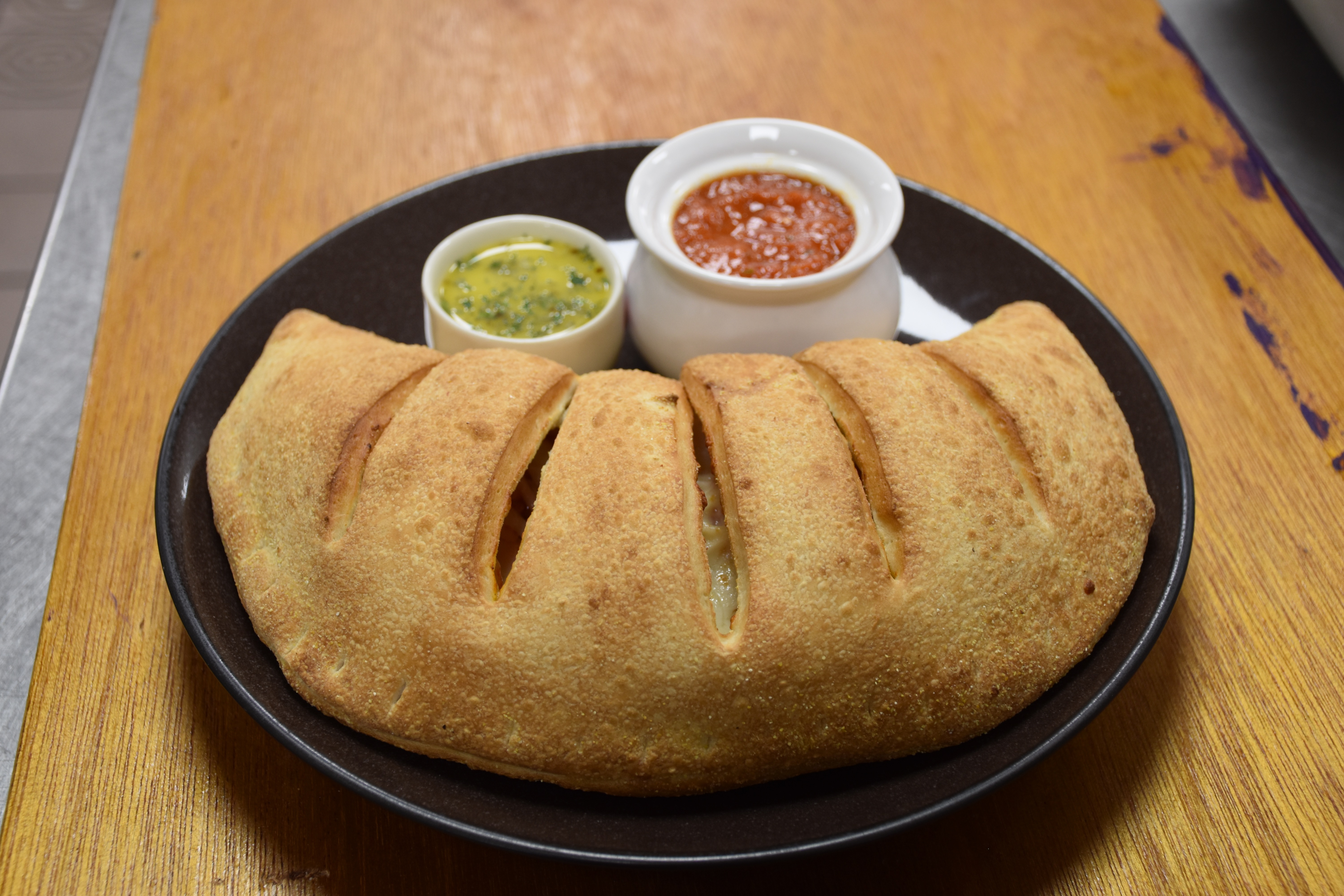 Order Cheese Stromboli food online from Pizzaman Restaurant store, Columbia on bringmethat.com
