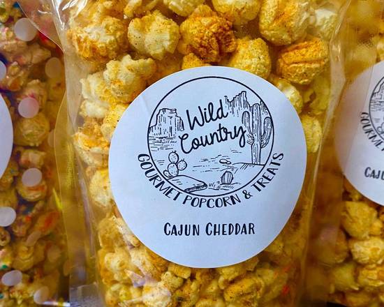 Order Wild Country Gourmet Popcorn - Cajun Cheese food online from The Sugar box store, Apache Junction on bringmethat.com