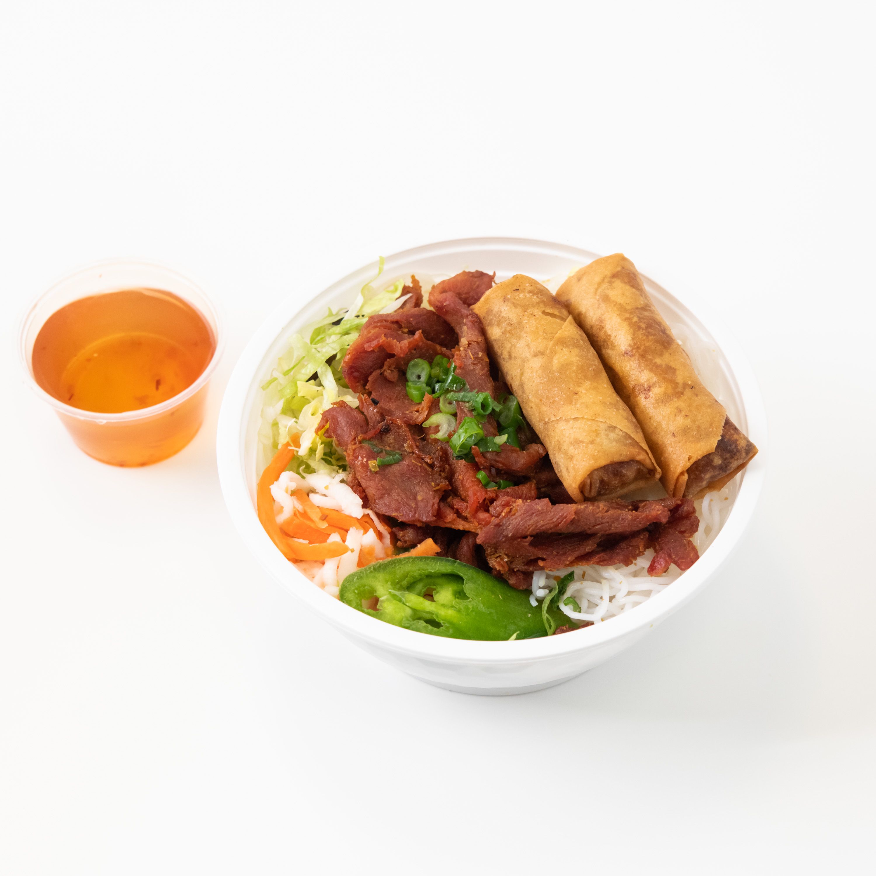 Order THH Vermicelli with Grilled Pork and Eggrolls food online from Thh Sandwiches & Coffee store, Anaheim on bringmethat.com