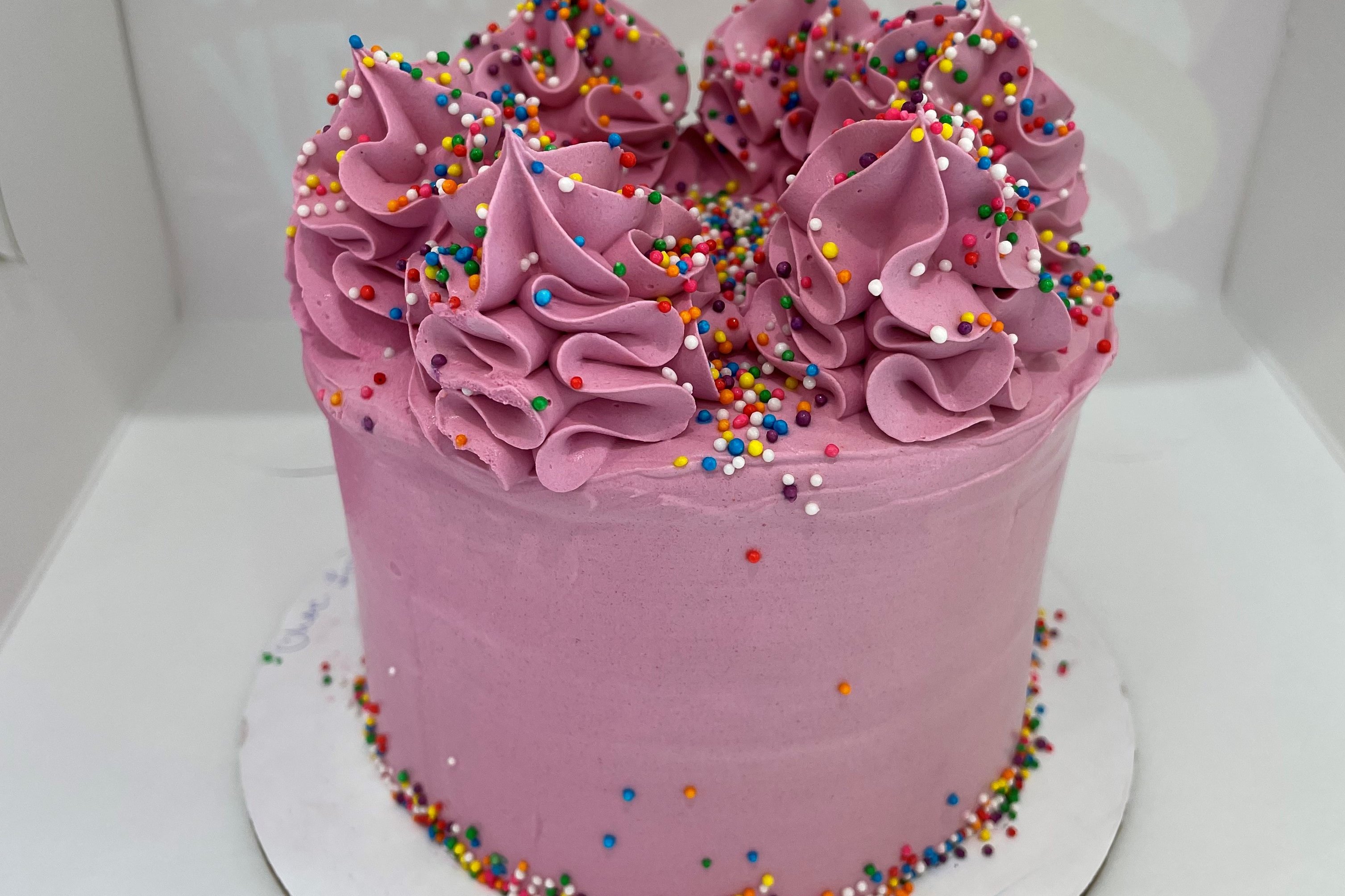 Order NEW! - Colorful Mini Cake! food online from Menchie's Frozen Yogurt store, Colleyville on bringmethat.com