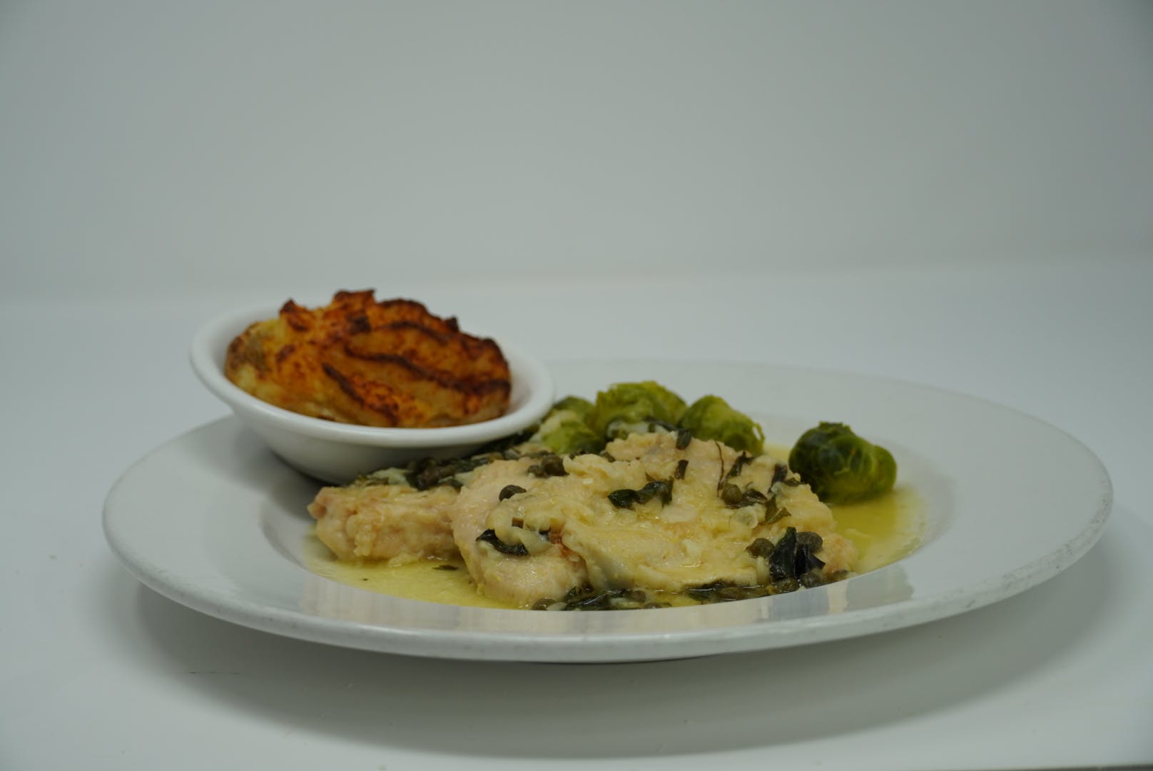 Order Chicken Piccata - Platter food online from DeNunzio's Italian Restaurant - Latrobe store, Latrobe on bringmethat.com