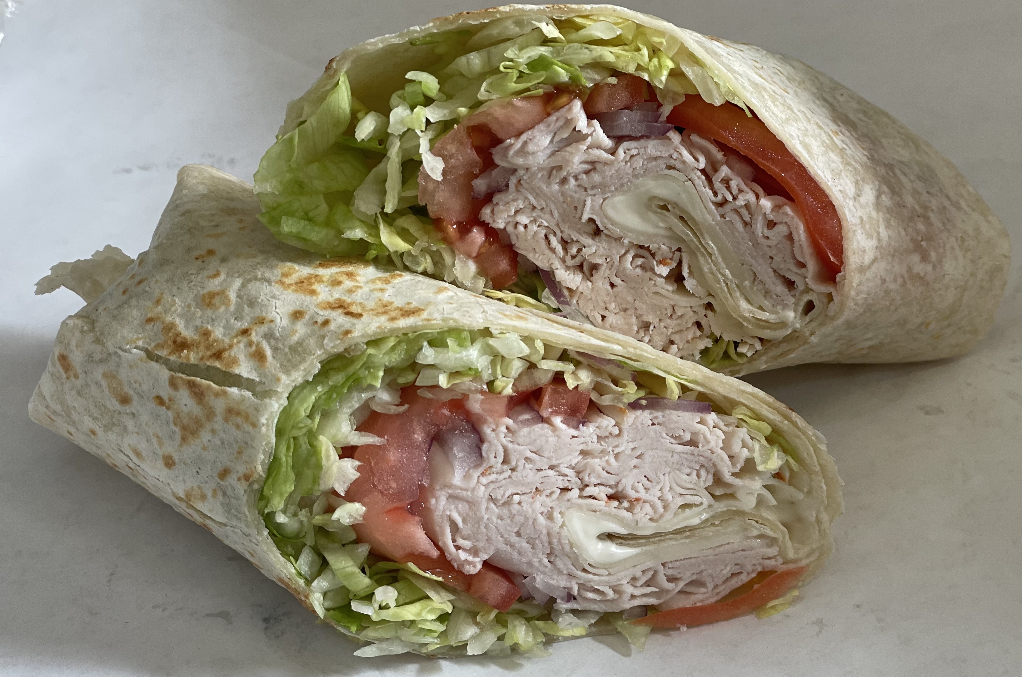 Order New Englander Wrap food online from Anthony Deli store, White Plains on bringmethat.com