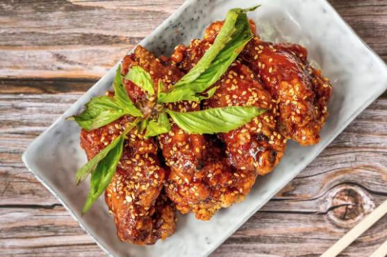 Order Spicy Korean Chicken Wings (6 pcs) food online from Corner Park Cafe store, Santa Rosa on bringmethat.com