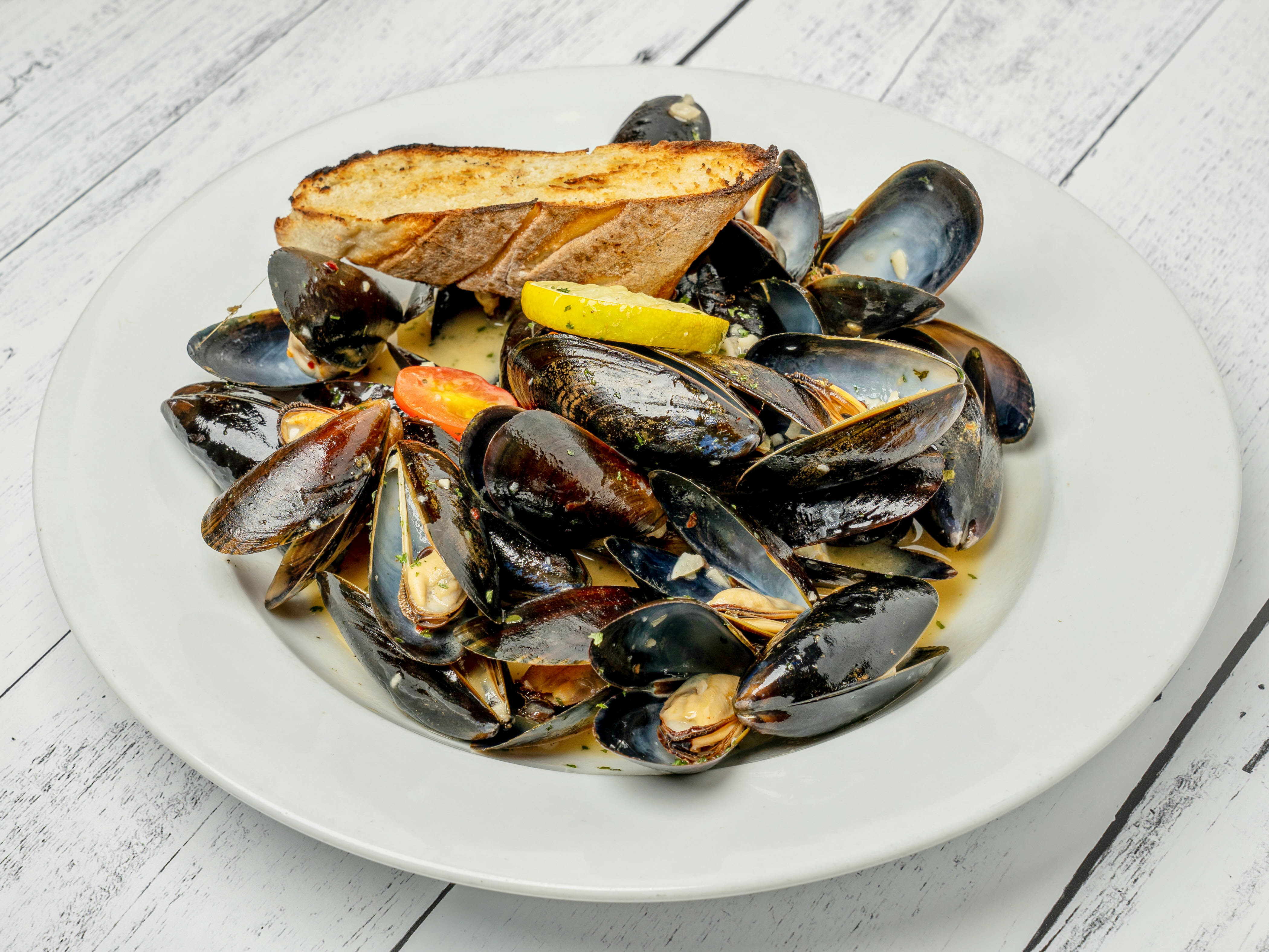 Order Mussels Plate food online from Salvatore's Restaurant store, Lawrence on bringmethat.com