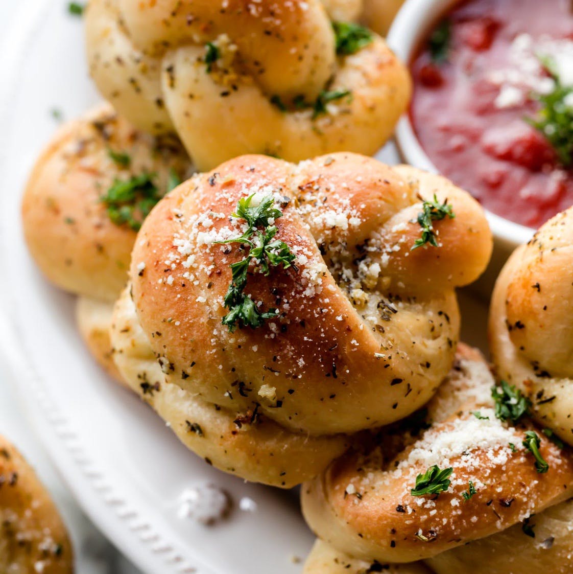 Order Garlic Knots - 6 Pieces food online from Mannino's Pizzeria & Italian Eatery store, Pottstown on bringmethat.com