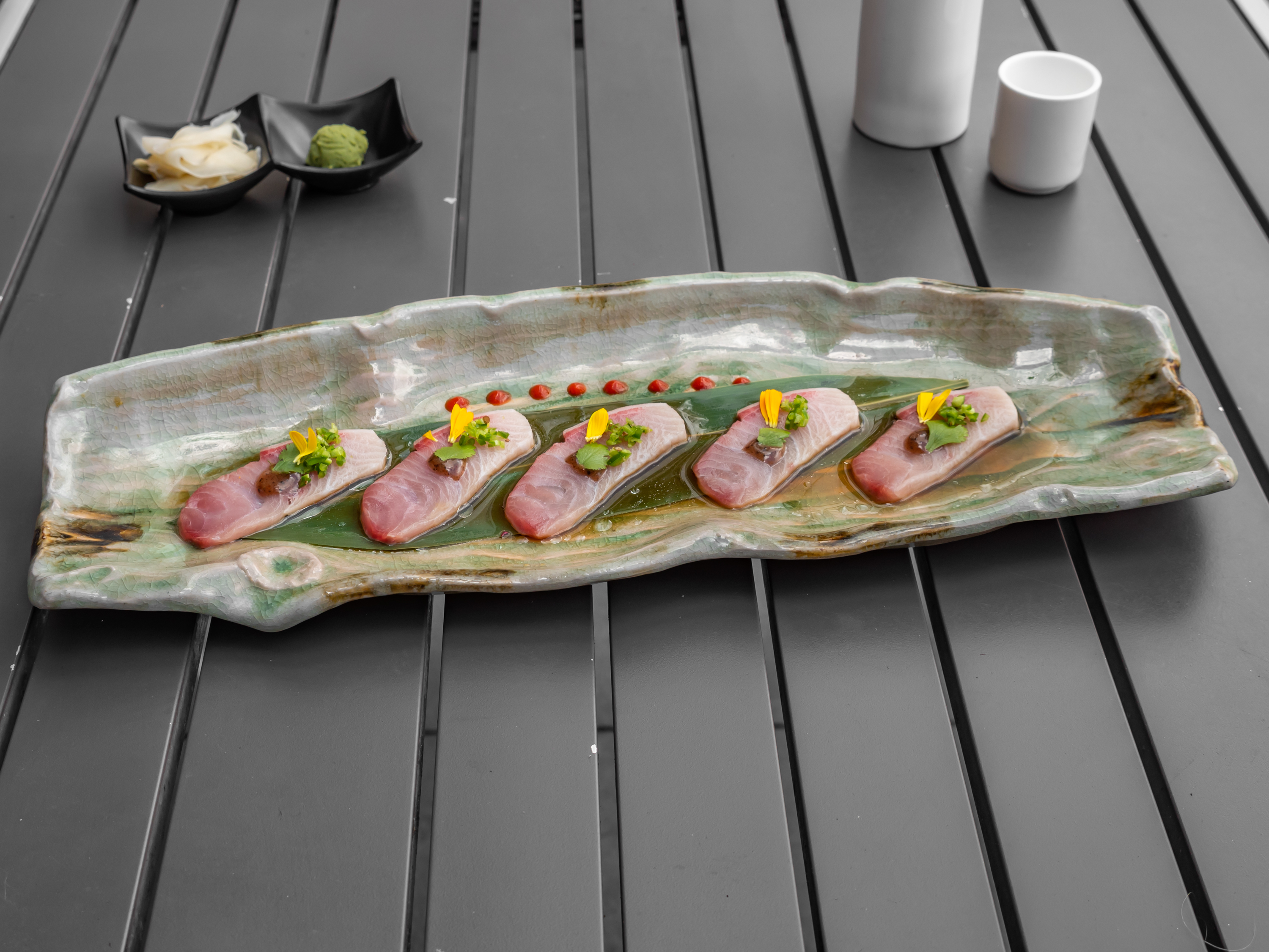 Order Yellowtail Cilantro Sashimi food online from Tokyo Cube store, Los Angeles on bringmethat.com