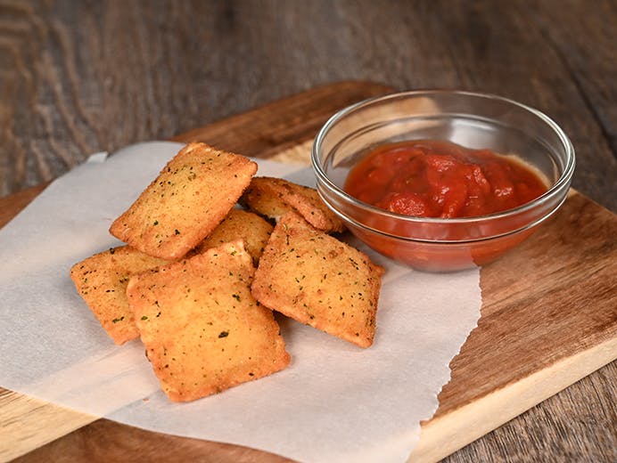 Order Fried Cheese Ravioli - Appetizer food online from Chicago Dough Company store, Richton Park on bringmethat.com