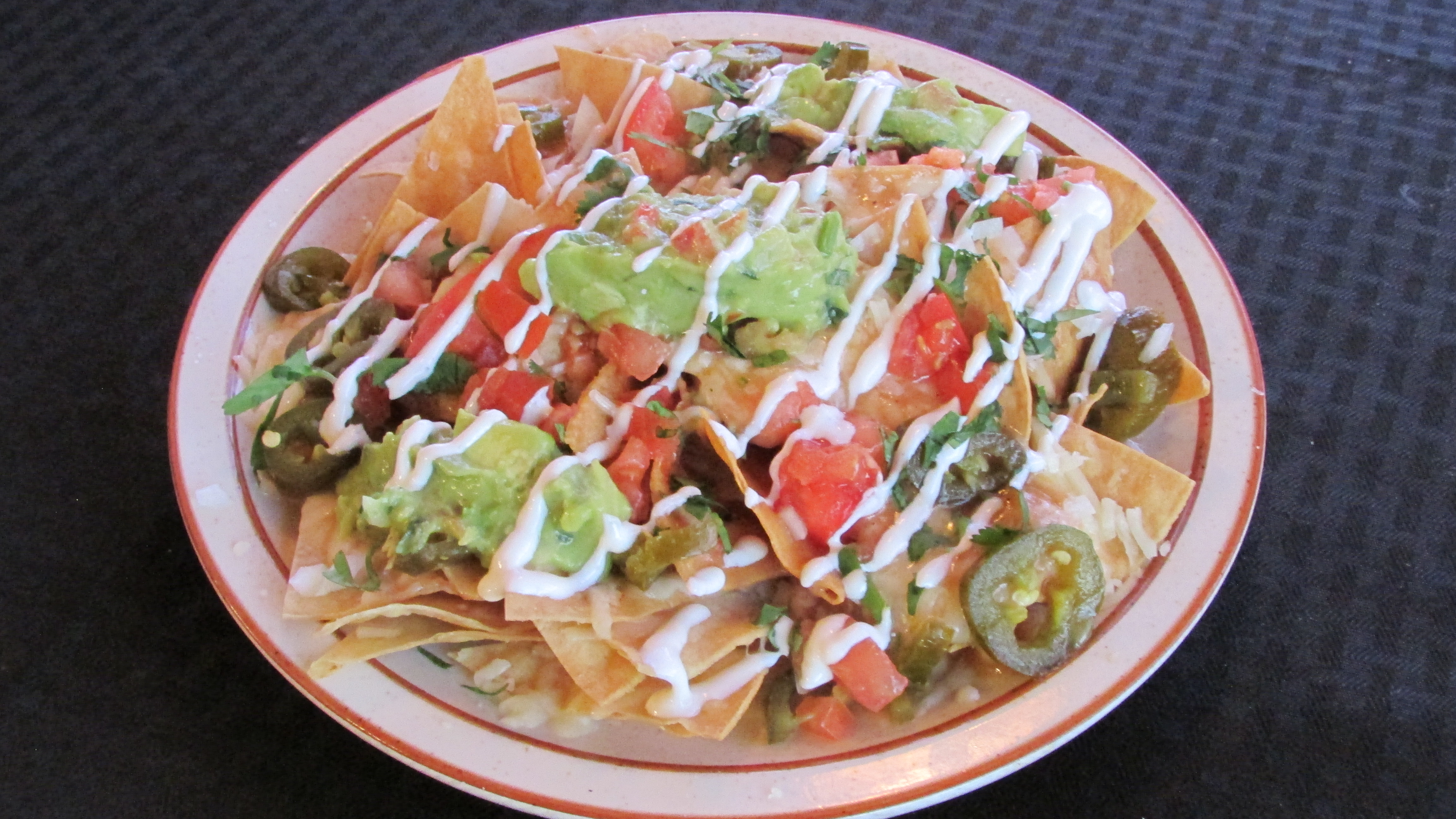 Order Nachos food online from Tortillas Restaurant store, Cathedral City on bringmethat.com