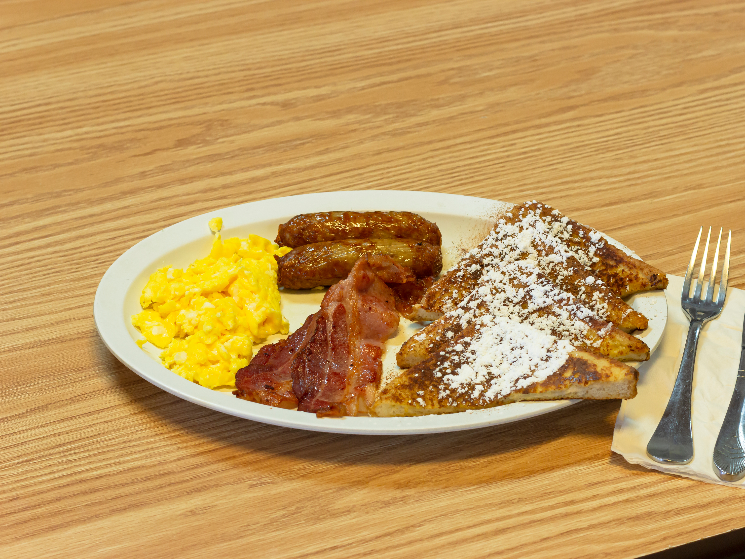 Order 1 French Toast + 2 + 2 food online from Charlie Cafe store, Norfolk on bringmethat.com
