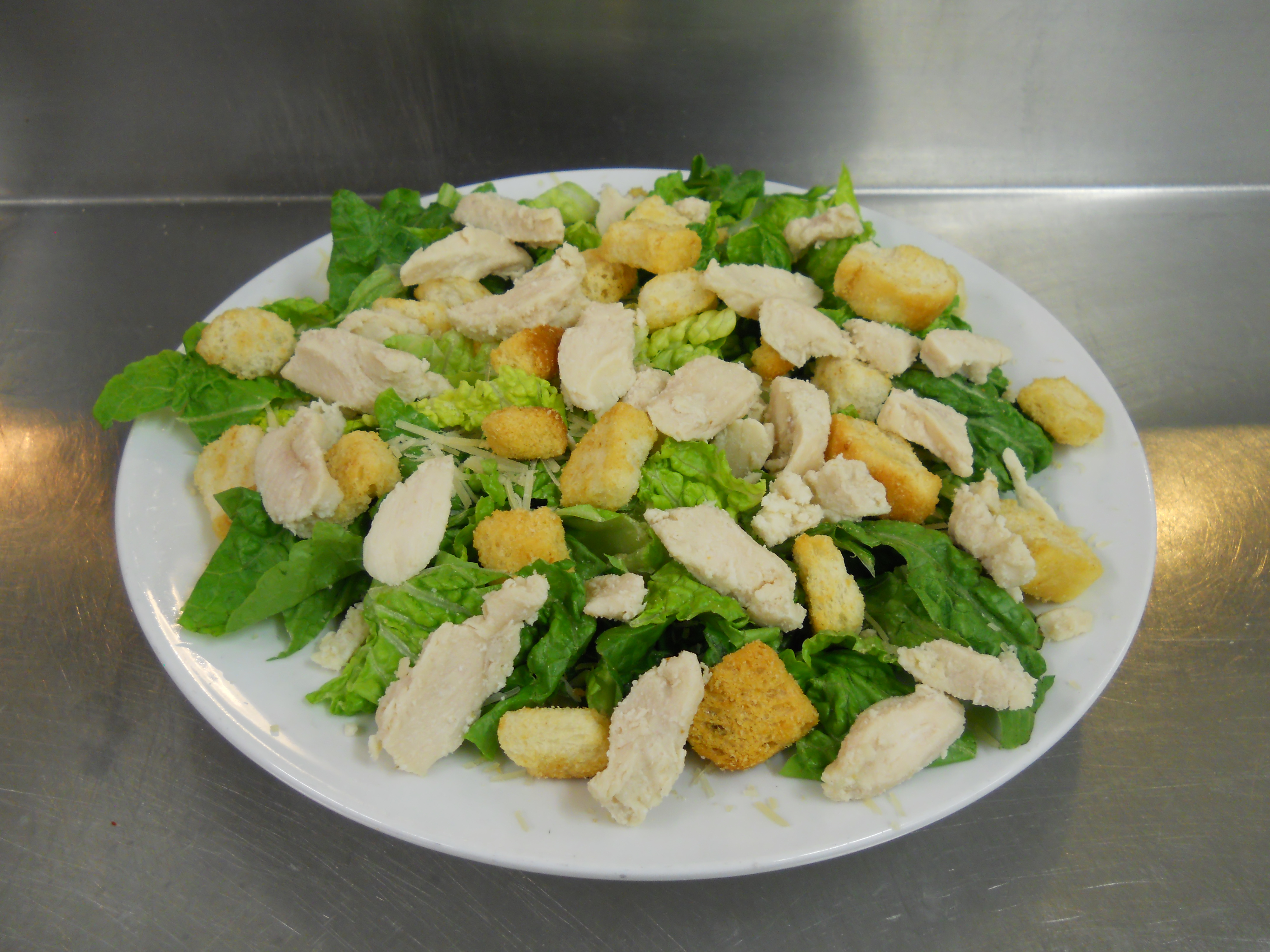 Order Caesar Salad with Chicken  food online from Aurelio Pizza store, Chicago on bringmethat.com