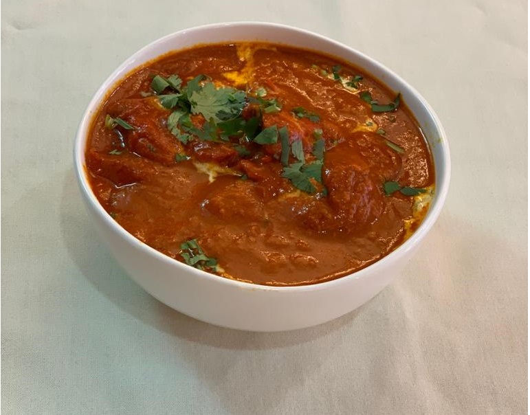 Order Chicken Tikka Masala food online from The India House store, Houston on bringmethat.com