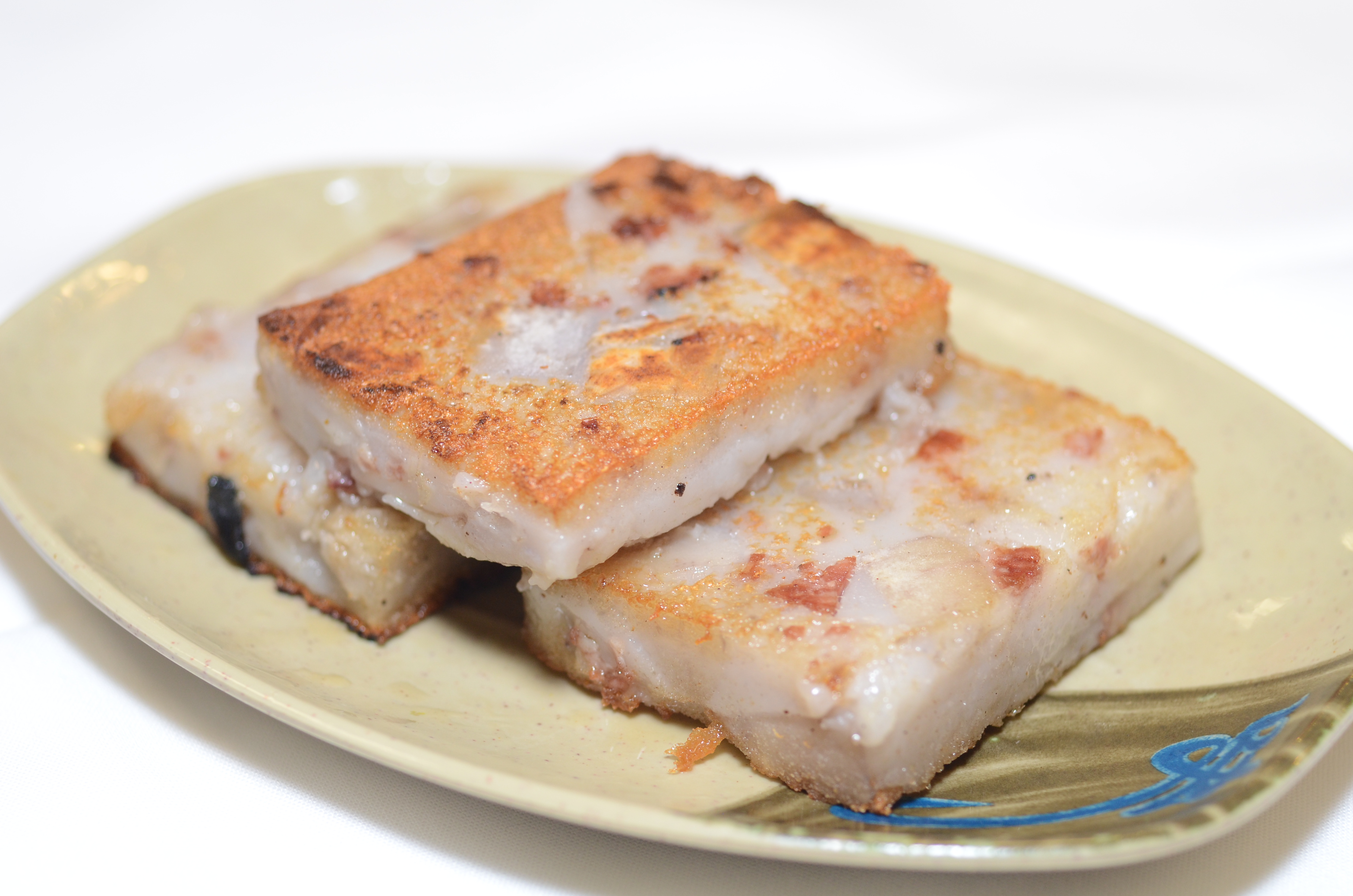 Order Pan Fried Turnip Cake food online from Asian Pearl store, Richmond on bringmethat.com
